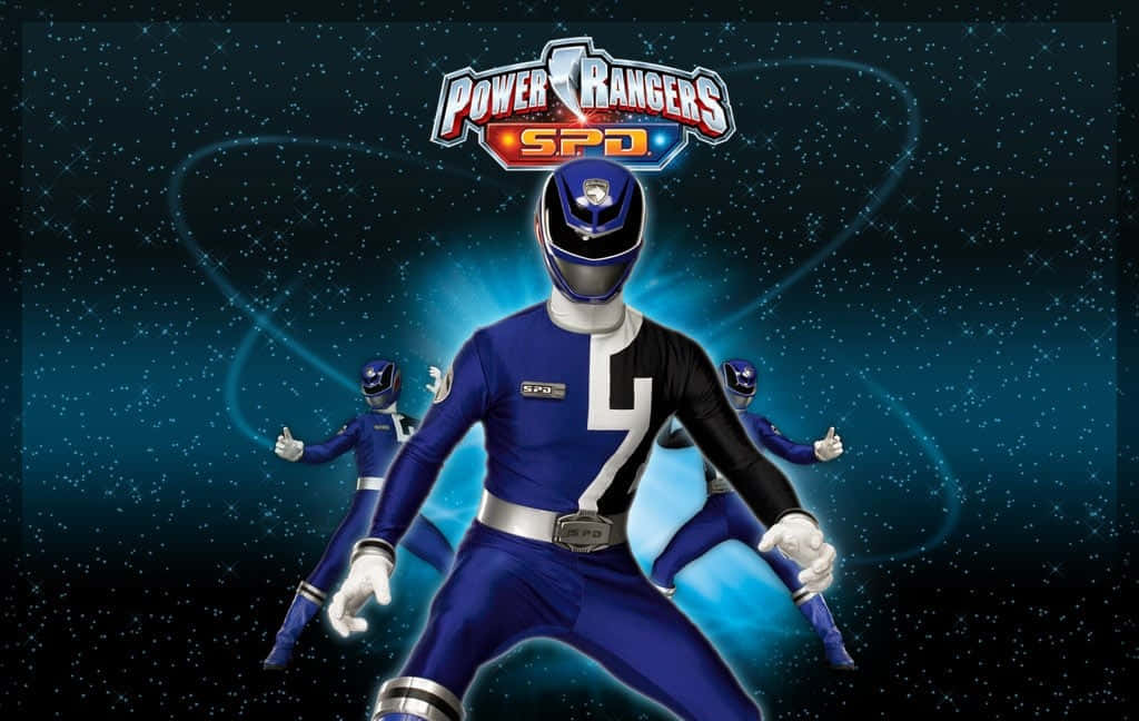 金剛戰士 桌布 壁紙 — 藍色Power Ranger SPD英雄地站在星空宇宙背景下，伴隨著發光的能量軌跡和兩個動態姿勢的隊友。