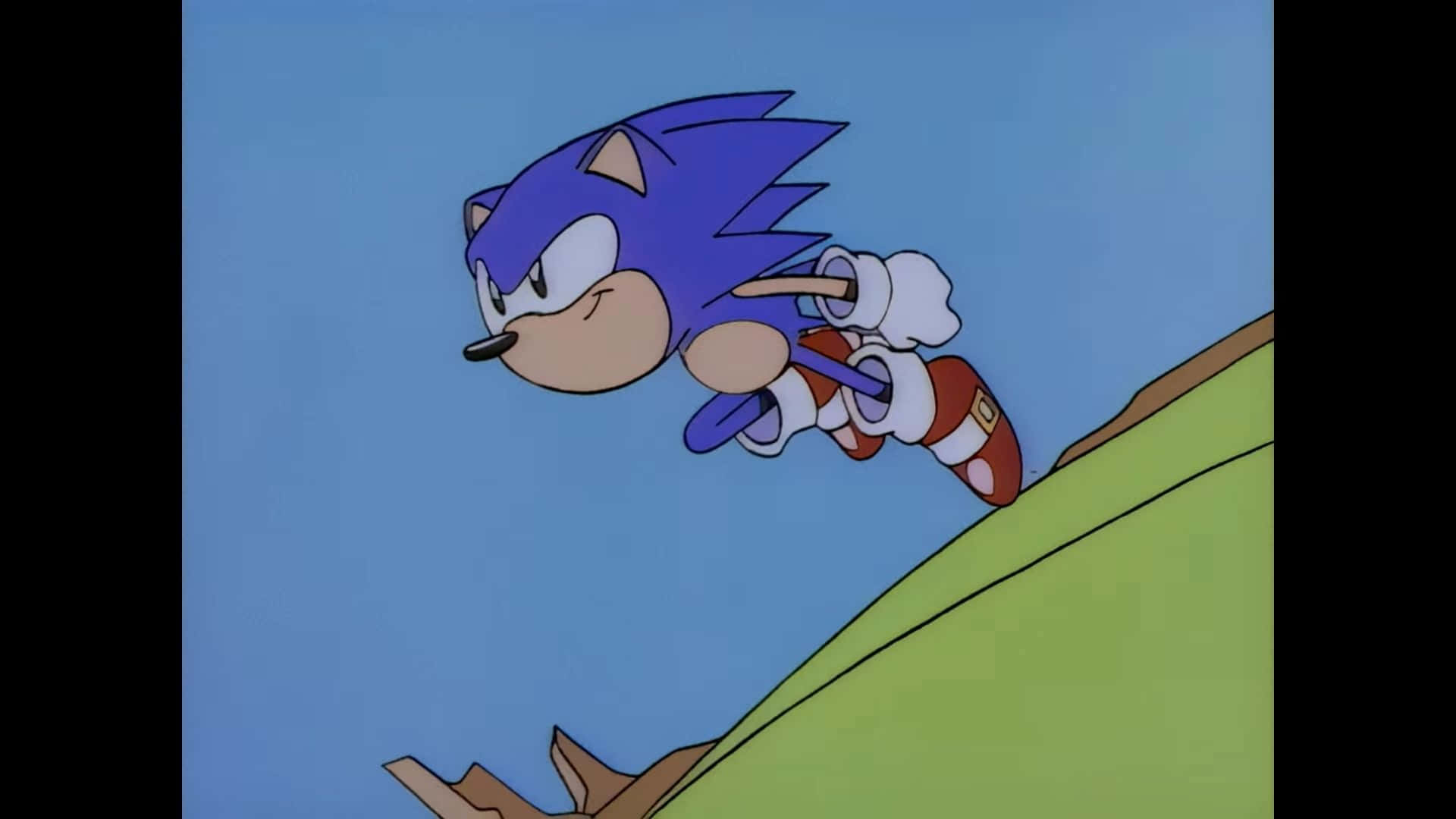 Classic Sonic 桌布 壁紙 — 藍色刺蝟 Sonic the Hedgehog 在晴朗的藍天下高速奔跑越過綠色山丘。
