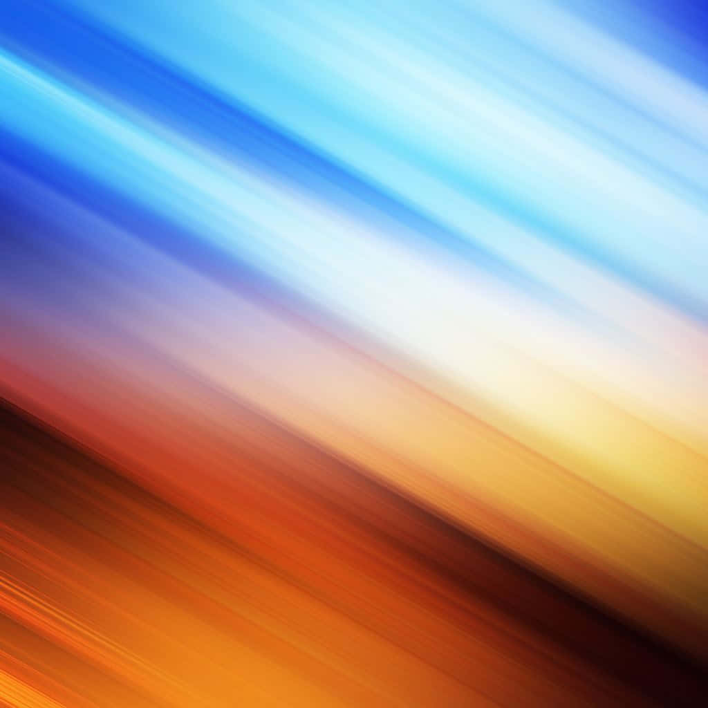motion 桌布 壁紙 — 藍色和橙色的鮮豔對角線條紋在畫面中模糊成平滑的漸變。
