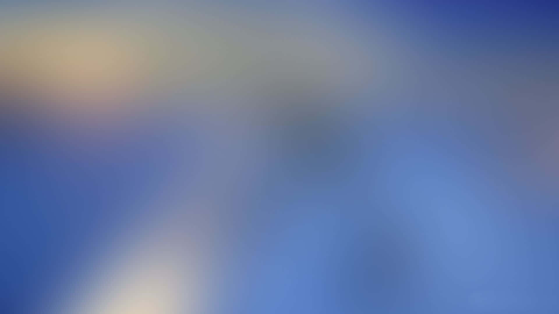 漸層 桌布 壁紙 — 藍色和黃色色調的柔和漸變，融合成夢幻般的抽象背景。