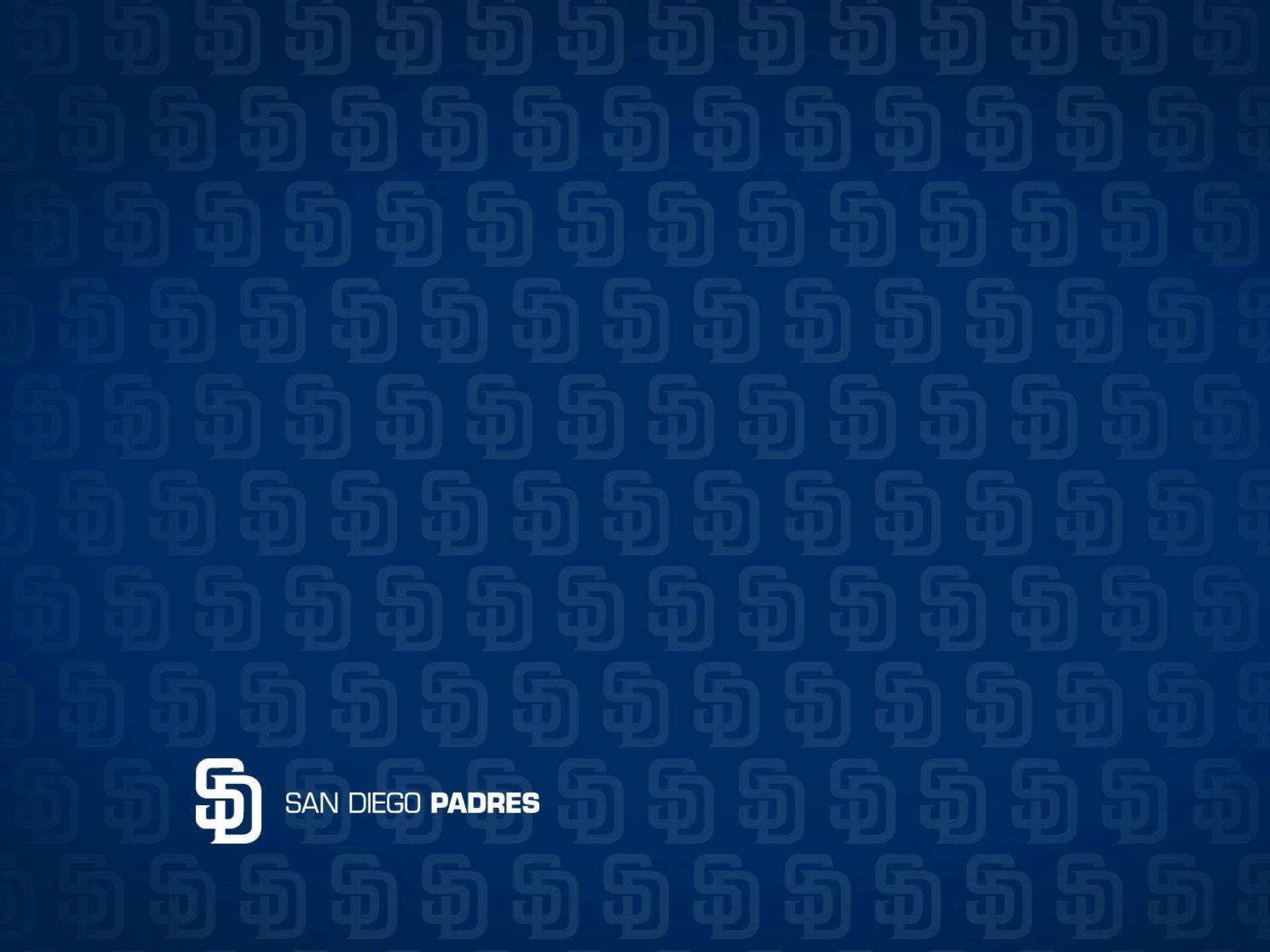 Padres 桌布 壁紙 — 藍色桌布，帶有重複的 SD 標誌和左下角的白色聖地牙哥教士隊標誌。