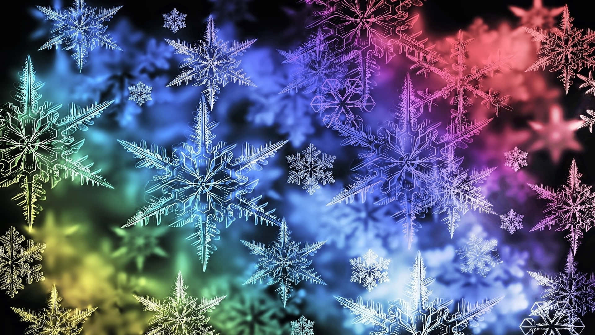 雪花 桌布 壁紙 — 虹彩雪花在深色漸變天空背景下散發出鮮豔的霓虹色彩。