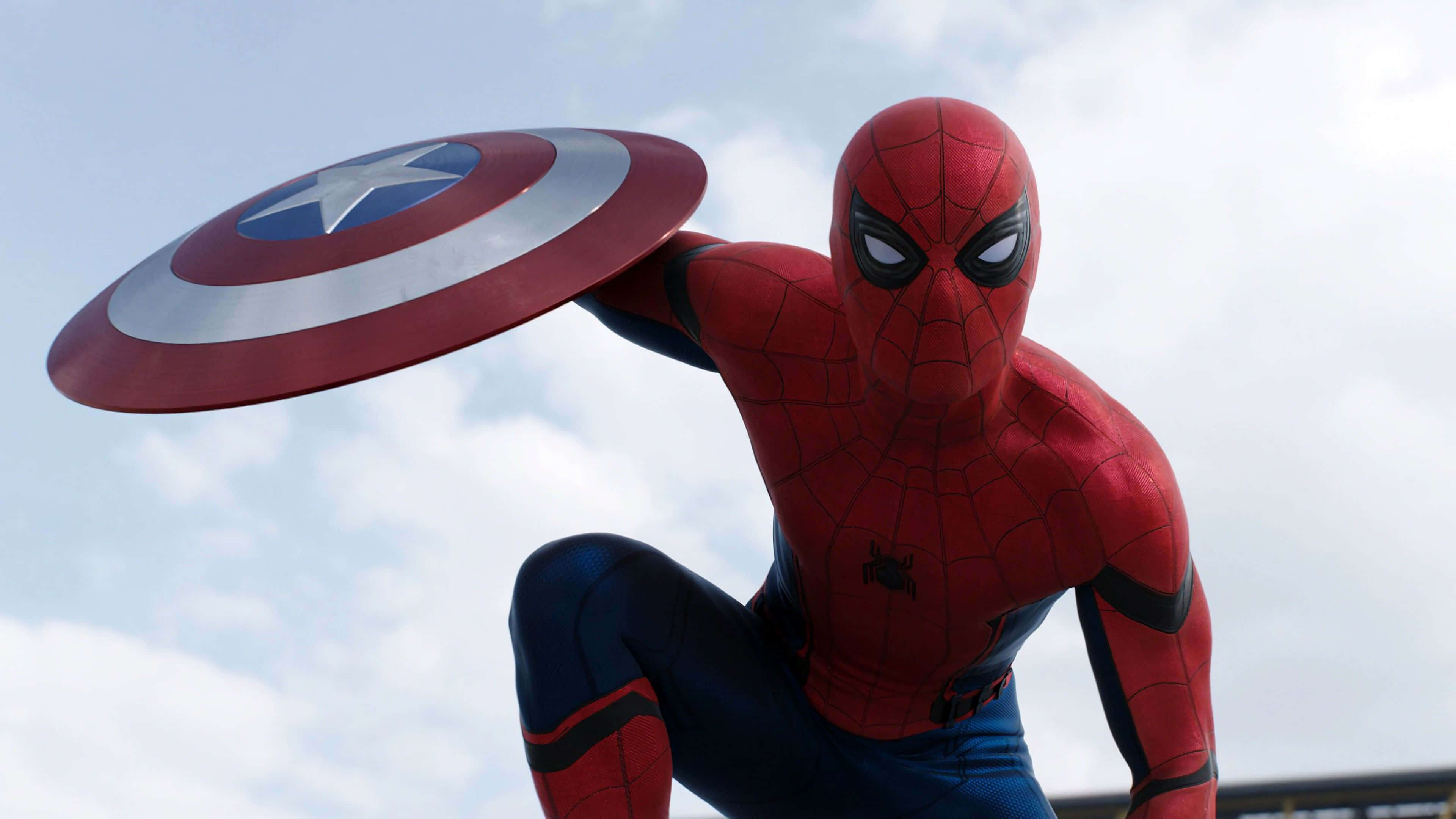 Best Spider Man 桌布 壁紙 — 蜘蛛人動態地蹲下，手持美國隊長的盾牌，背景是陰天。