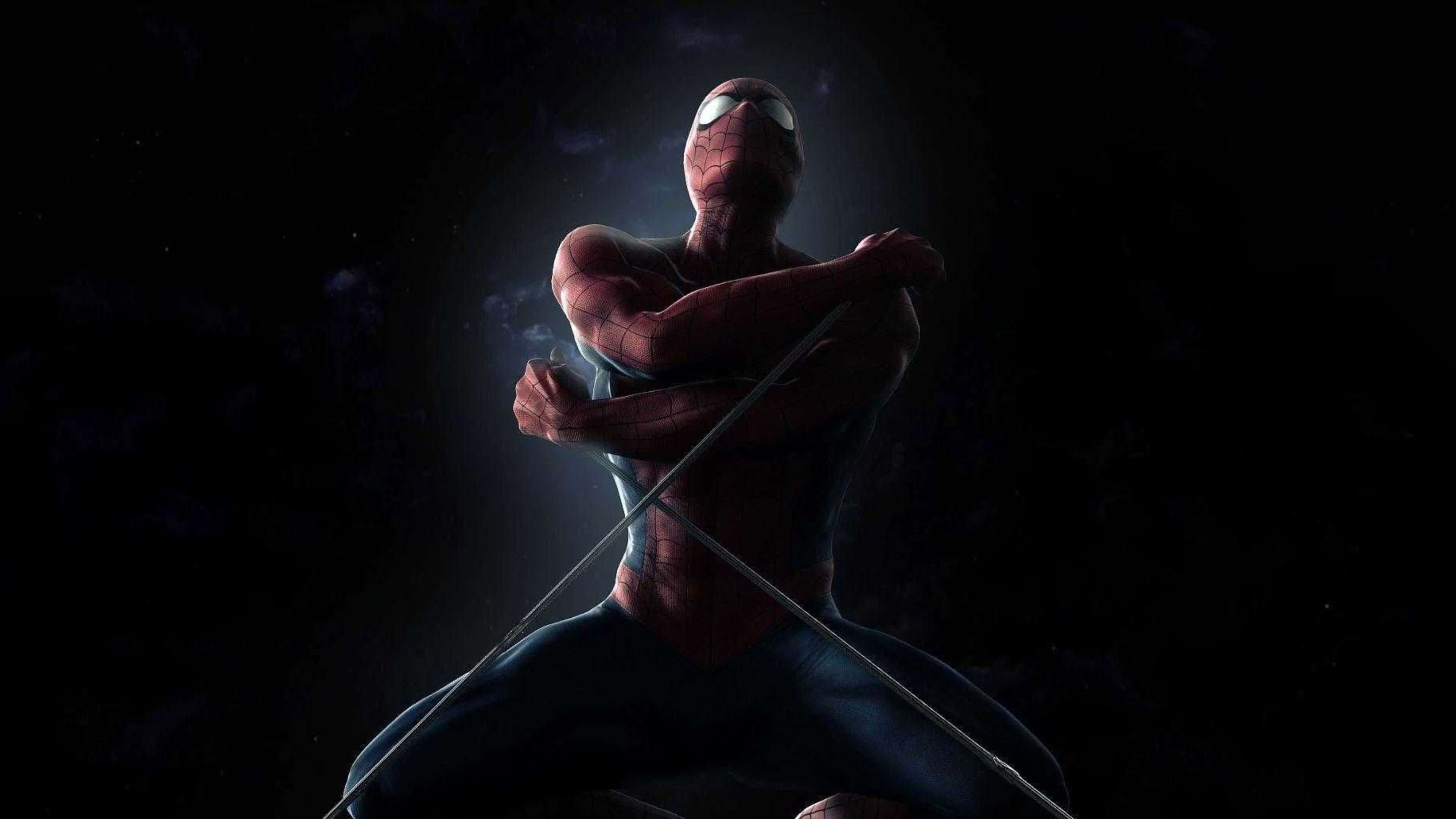 4K Marvel 壁紙 桌布 壁紙 — 蜘蛛人在黑暗的宇宙虛空中擺好姿勢，眼睛發光，蜘蛛網線條橫跨他的身體。