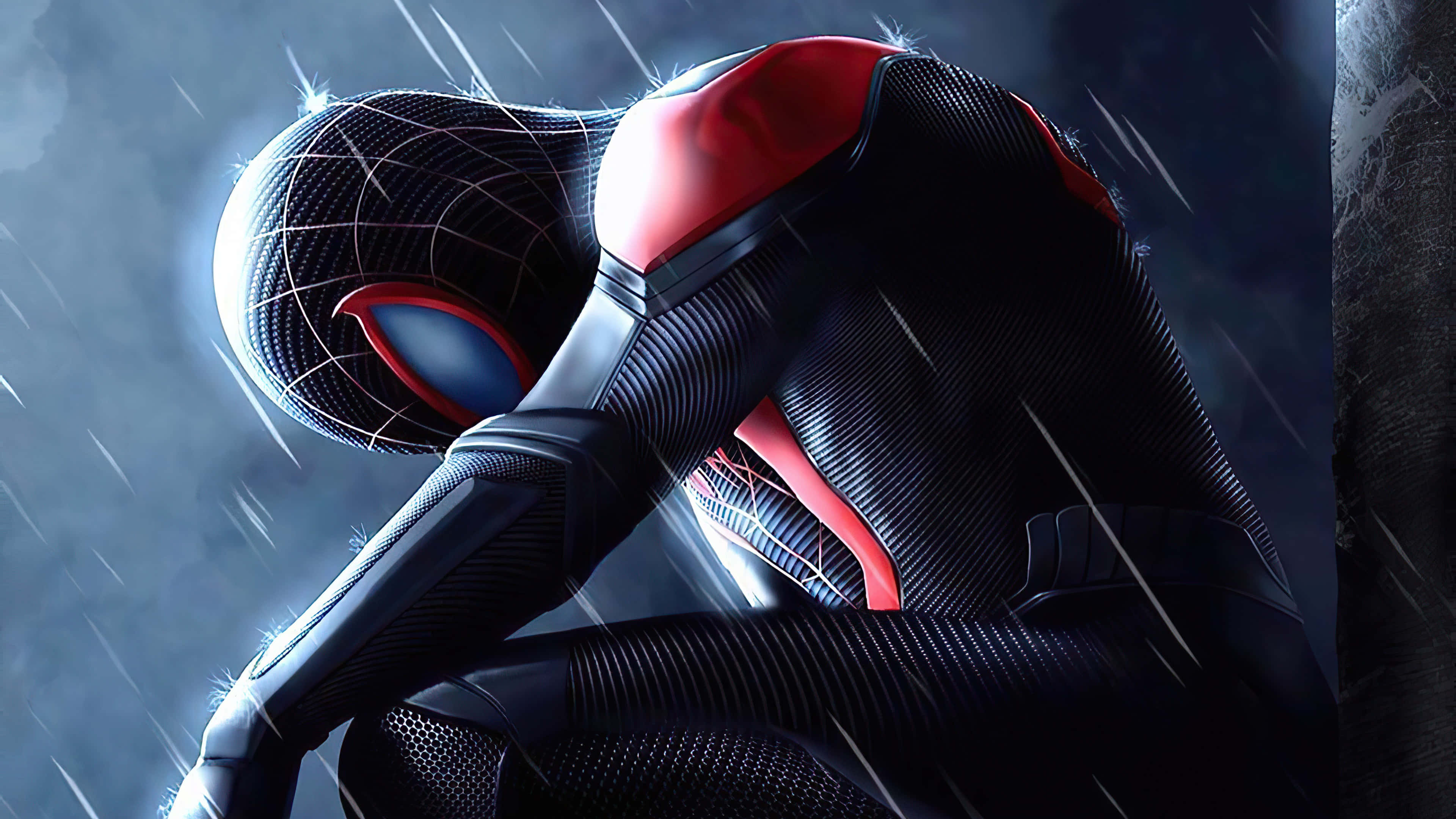 Spider Man Miles Morales Ps5 桌布 壁紙 — 蜘蛛人穿著時尚的黑色和紅色戰衣，在暴風雨中蹲下，戲劇性的燈光突顯了他有紋理的盔甲。