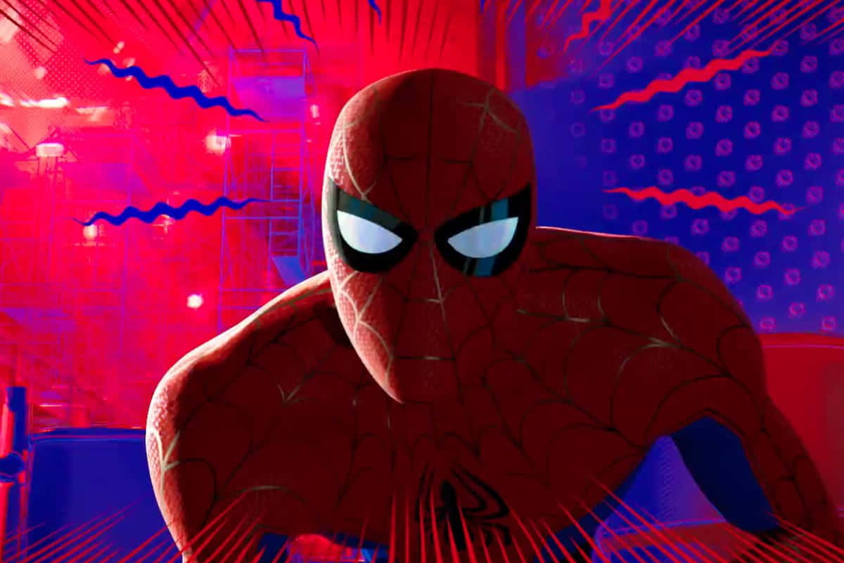 Spider-man Spider Sense 桌布 壁紙 — 蜘蛛人穿著紅藍戰衣，在充滿活力的漫畫風格城市背景下，伴隨著電光火石的紅藍能量爆發，動態地蹲伏著。