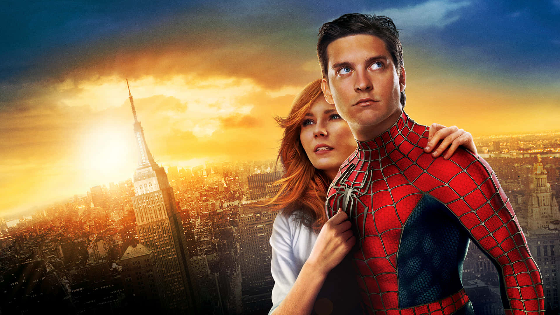 Spider Man 3 桌布 壁紙 — 蜘蛛人與關·史黛西在紐約市天際線（可見帝國大廈）上金色夕陽的映襯下並肩站立。