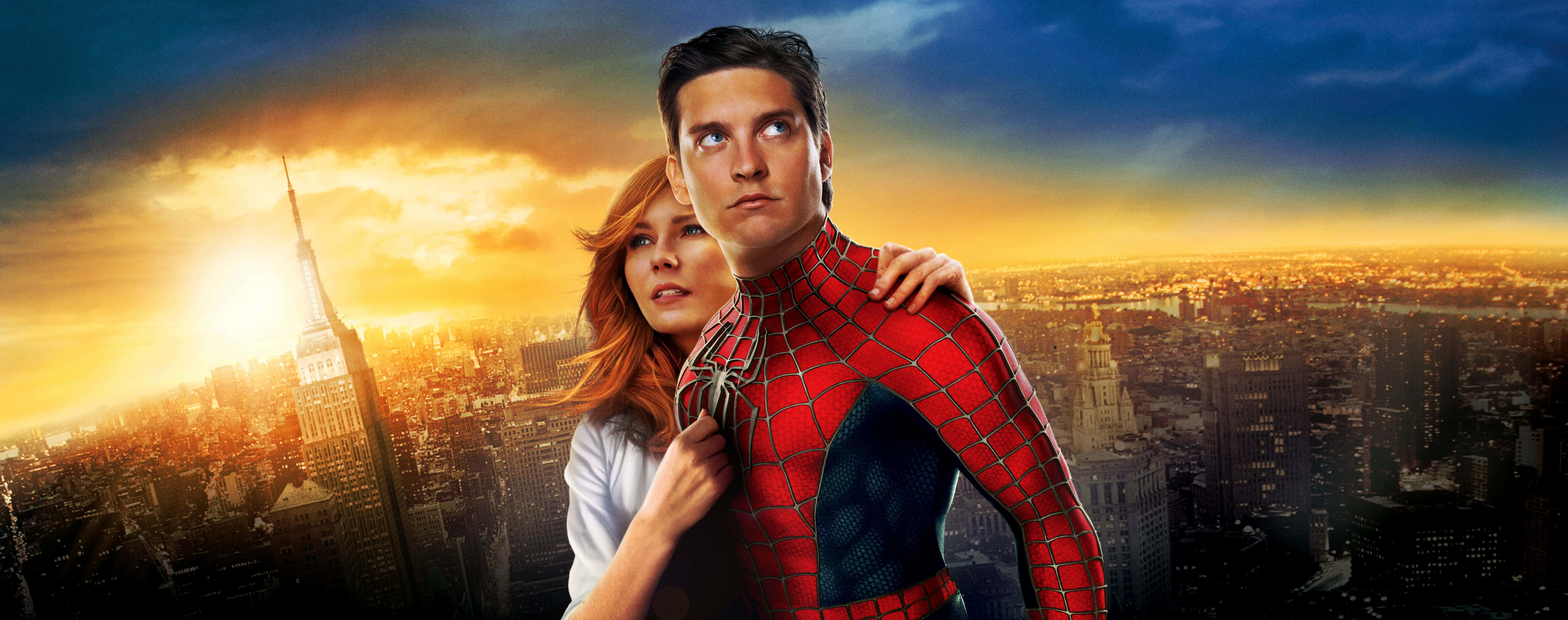 Spider Man 3 桌布 壁紙 — 蜘蛛人與關·史黛西站在摩天大樓頂端，背景是紐約天際線上的金色日落。