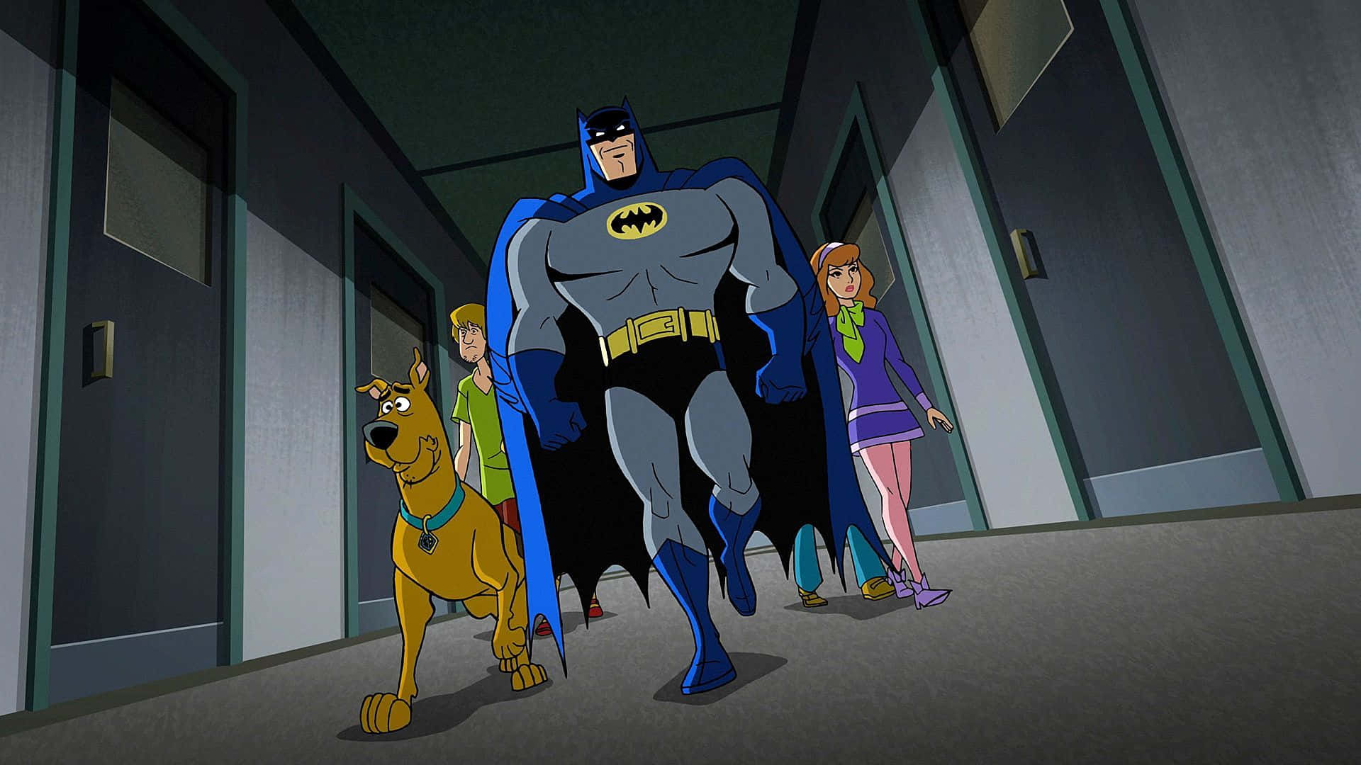 Batman The Brave And The Bold 桌布 壁紙 — 蝙蝠俠、史酷比和朋友們以經典動畫風格走在一條燈光昏暗的走廊上。