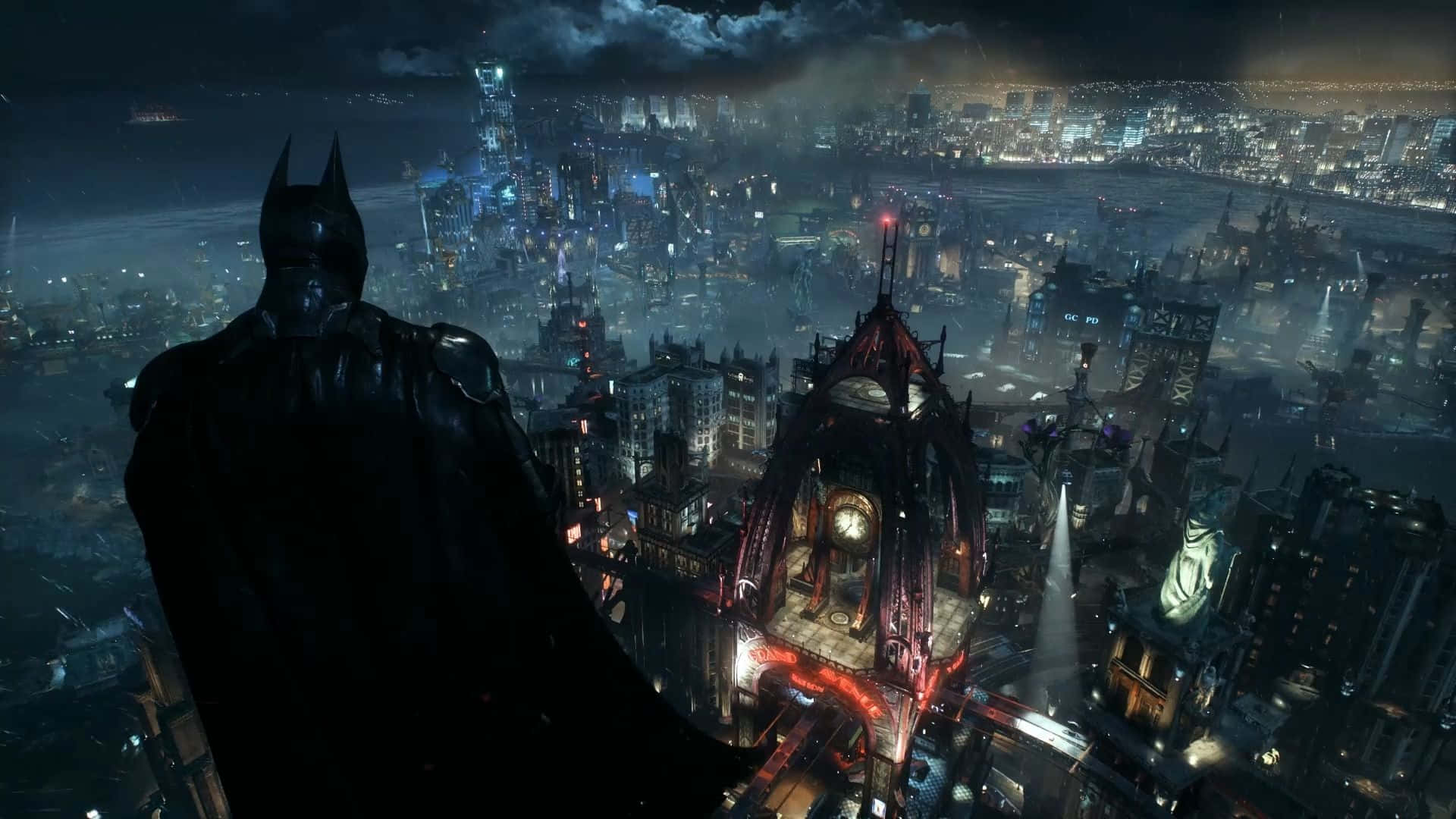 Batman City 桌布 壁紙 — 蝙蝠俠以剪影姿態站在哥德式塔樓頂端，俯瞰夜間高譚市霓虹燈閃爍、雨水浸濕的天際線。