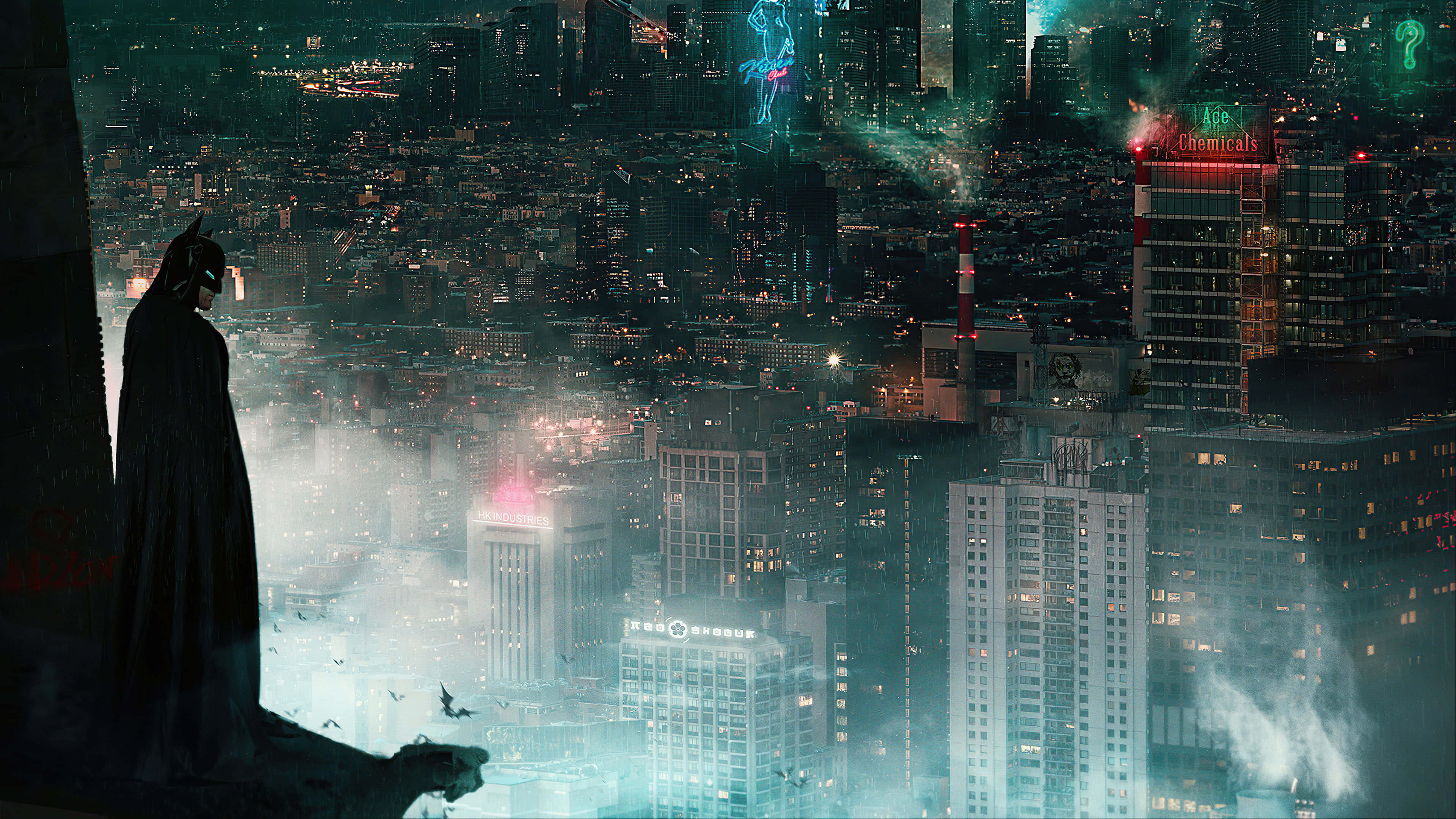 Gotham City 桌布 壁紙 — 蝙蝠俠以剪影姿態站在屋頂上，俯瞰著被霧氣和雨水籠罩、霓虹燈閃爍的高譚市。