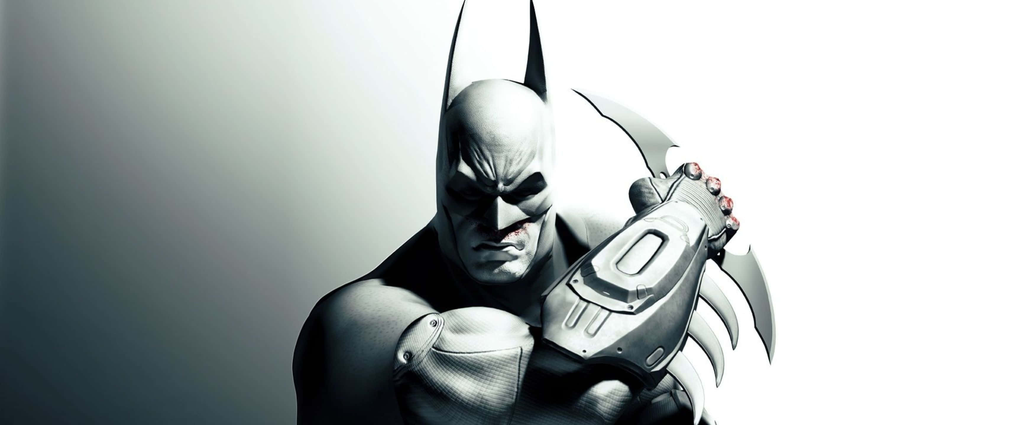 3440x1440p Batman Arkham City 桌布 壁紙 — 蝙蝠俠以單色鮮明姿態站立，緊握高科技護手，背景為灰色漸變。