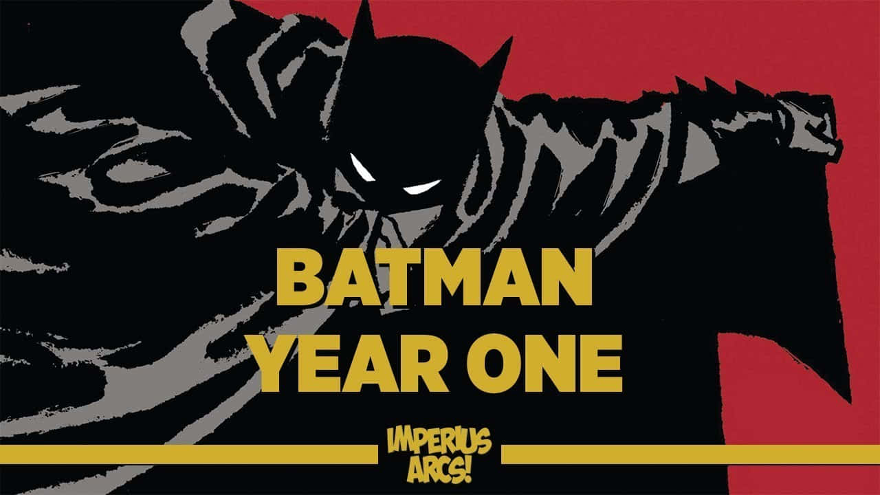 Batman Year One 桌布 壁紙 — 蝙蝠俠以粗獷的黑紅漫畫風格呈現，鮮紅背景上有粗體黃色文字寫著「BATMAN YEAR ONE」。