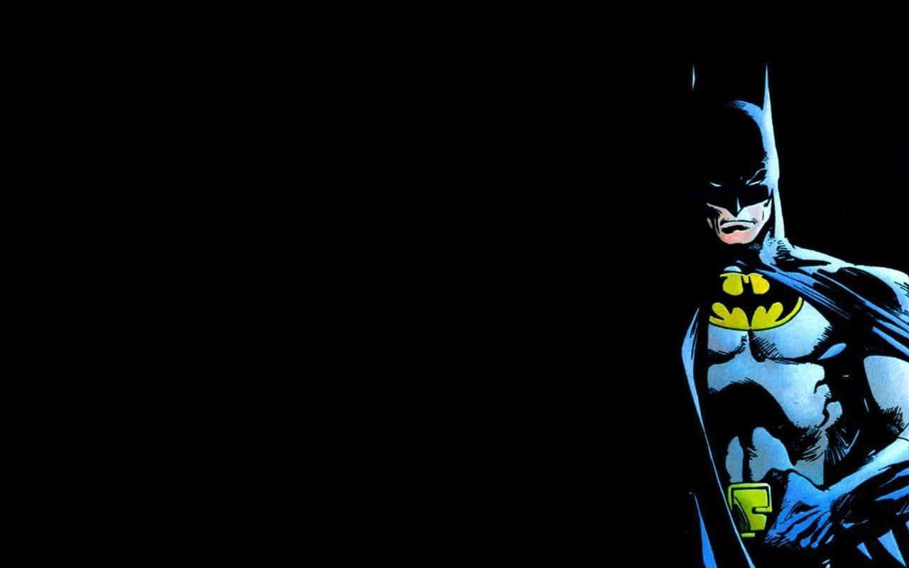 Batman Cartoon 桌布 壁紙 — 蝙蝠俠以陰影剪影站在黑色背景前，帶有戲劇性的藍色和黃色亮點。