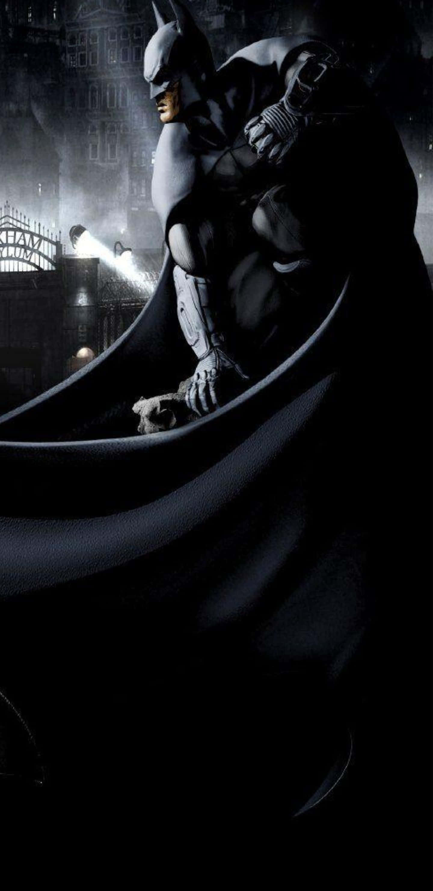 Pixel 3xl Batman Arkham City 桌布 壁紙 — 蝙蝠俠以陰影輪廓蹲伏在建築物頂部，俯瞰夜晚雨濕的高譚市景觀。