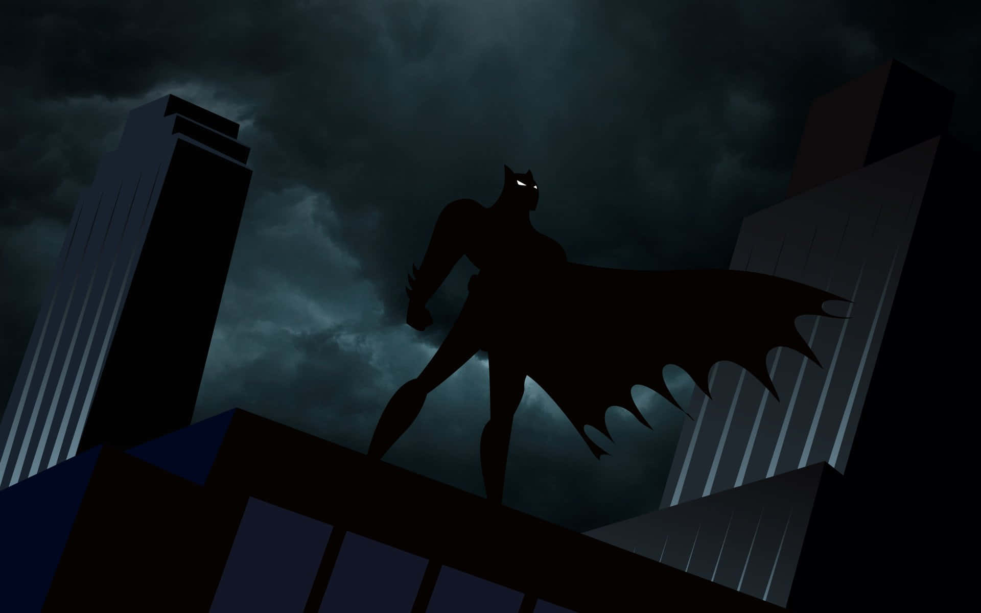 Batman Animated Adventures 桌布 壁紙 — 蝙蝠俠以黑暗剪影姿態站在城市屋頂上，背景是暴風雨的夜空，雙眼發光。