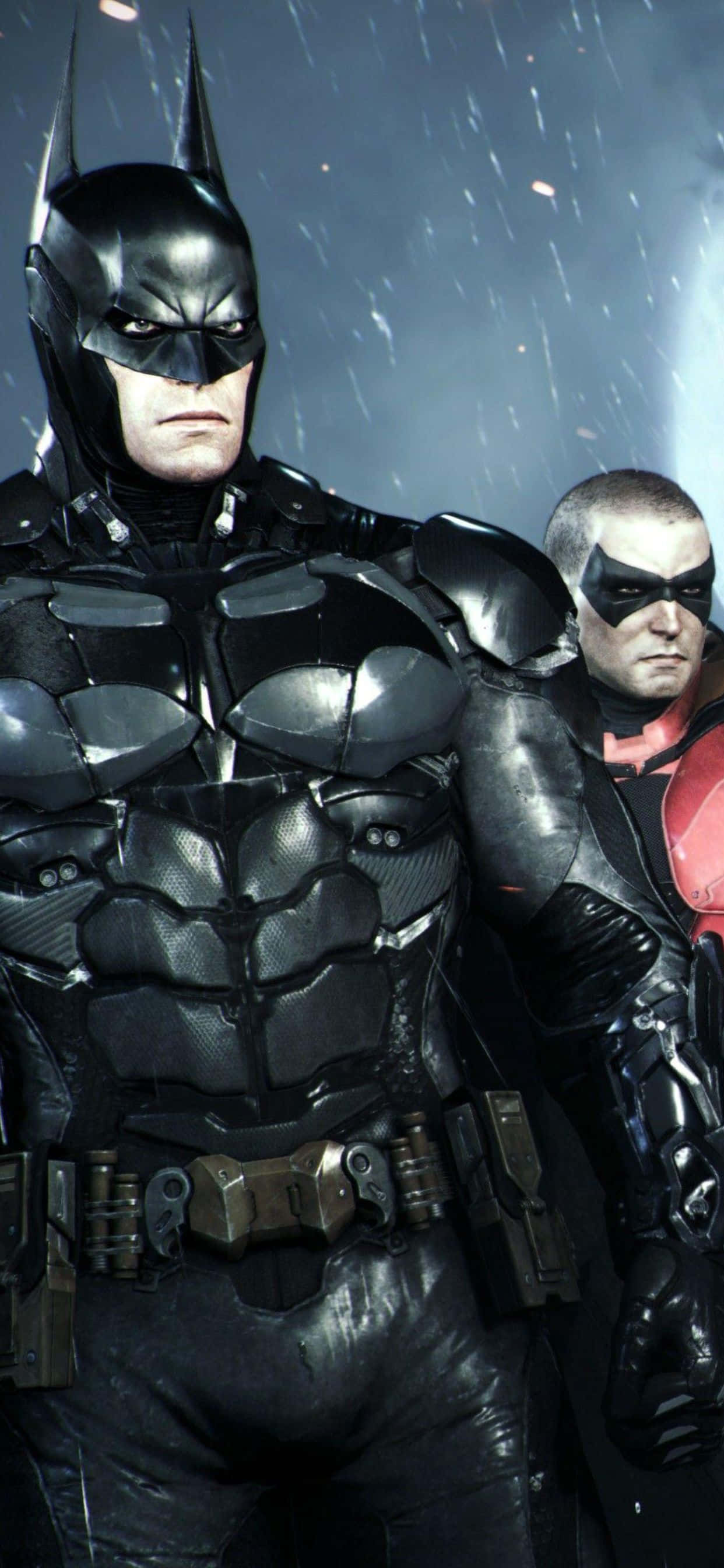 iPhone Xs Max Batman Arkham City 桌布 壁紙 — 蝙蝠俠和夜翼站在被雨水浸透的城市小巷中，昏暗的路燈下，水滴從他們的裝備上滴落。