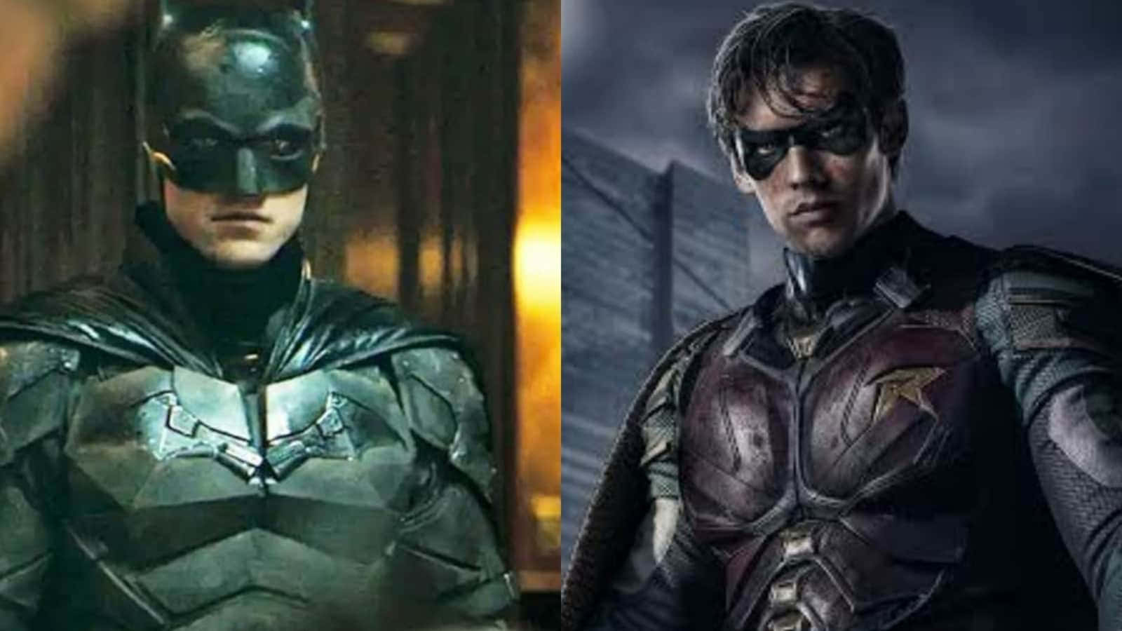 Batman And Robin 桌布 壁紙 — 蝙蝠俠和羅賓穿著深色裝甲服，在戲劇性燈光的 gritty 城市環境中並肩站立。