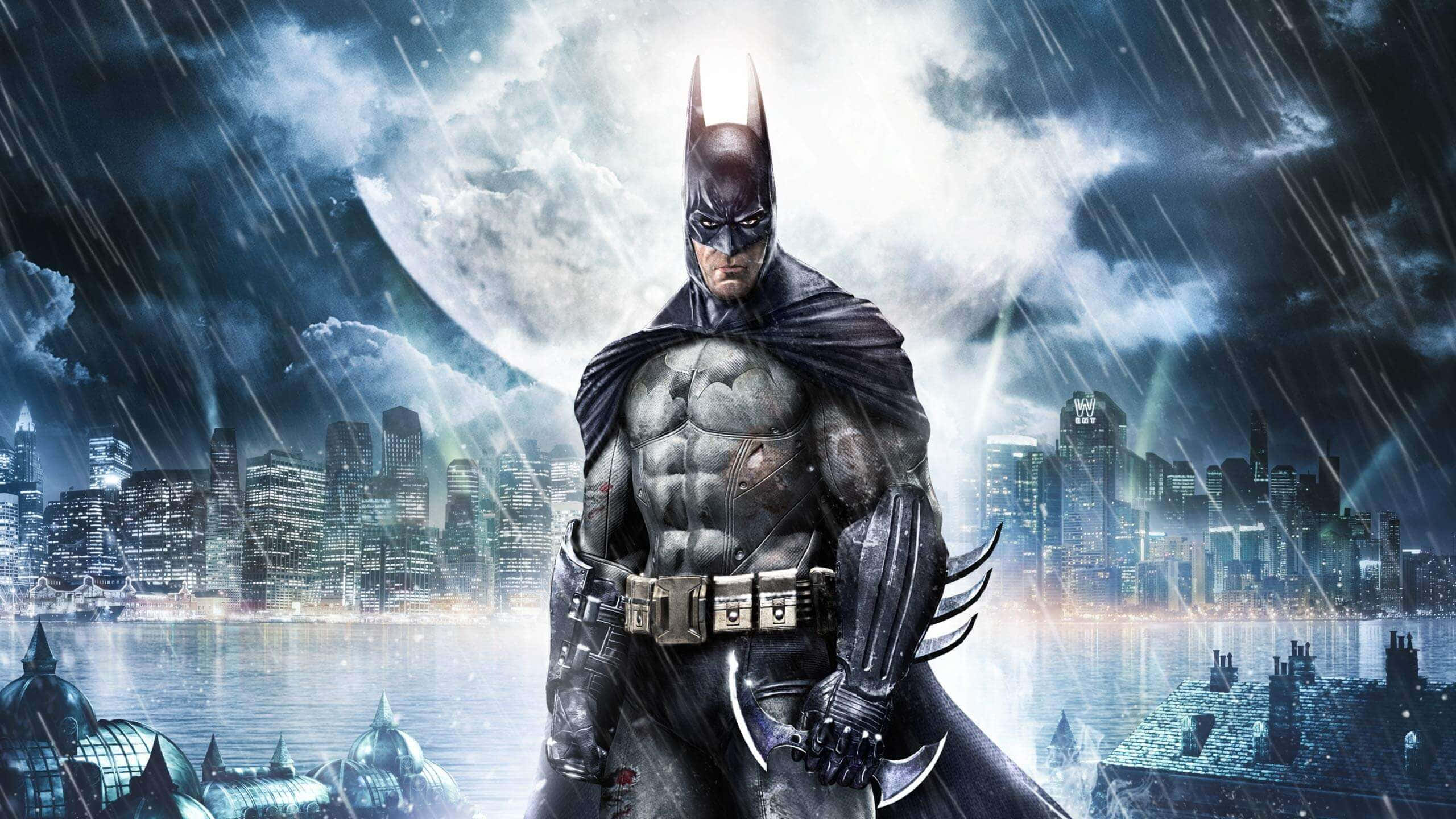 Arkham Asylum 桌布 壁紙 — 蝙蝠俠在巨大的月光天空下，堅定地站在被雨水浸透的高譚市景觀中。