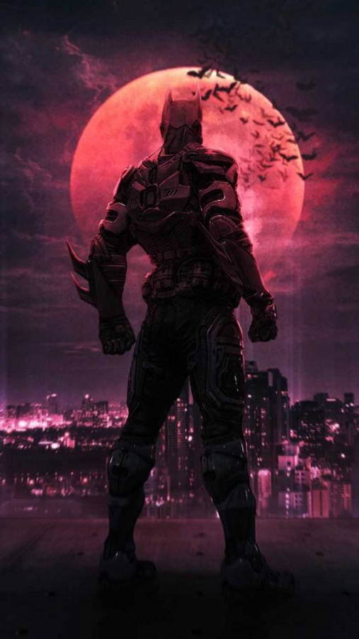 batman arkham city iPhone 桌布 壁紙 — 蝙蝠俠在巨大的紅月亮襯托下呈現剪影，蝙蝠在發光的城市上空飛翔。