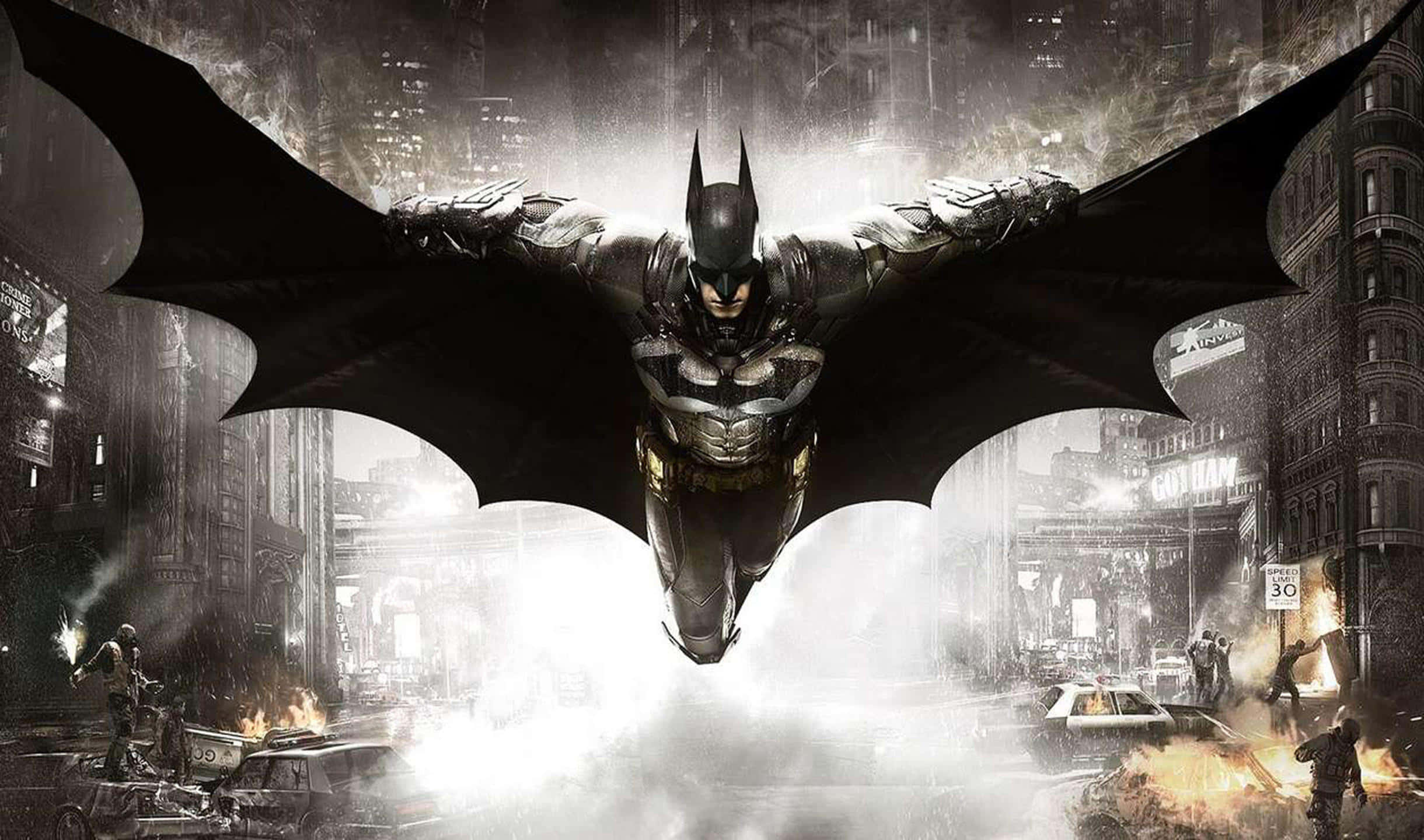 2440x1440 Batman Arkham City 桌布 壁紙 — 蝙蝠俠在雨中的高譚市天際翱翔，斗篷張開，下方是燃燒的街道和逃竄的市民。