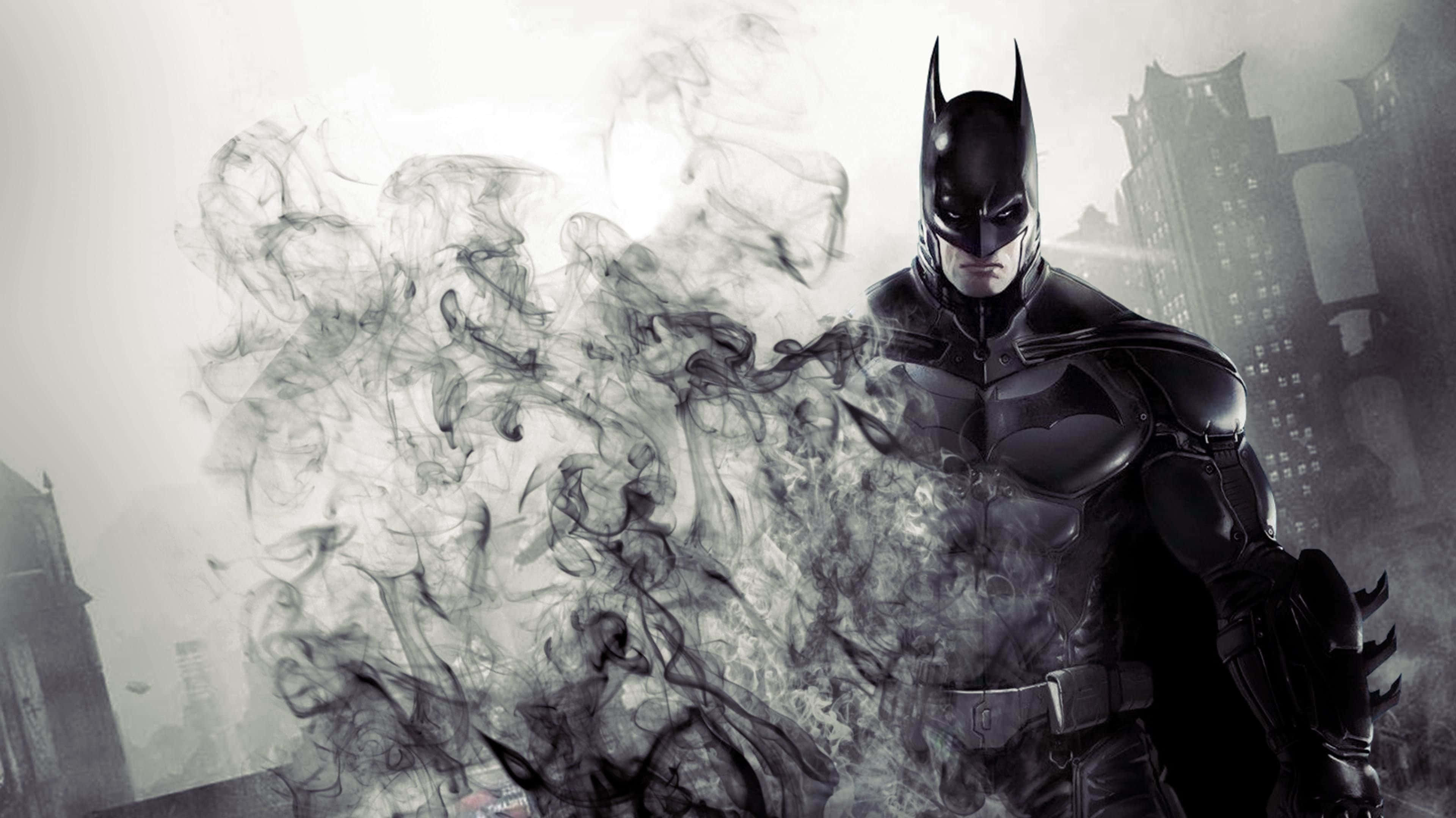 Awesome Batman 桌布 壁紙 — 蝙蝠俠從旋轉的煙霧中出現，背景是陰沉的高譚市天際線，營造出黑暗的電影場景。