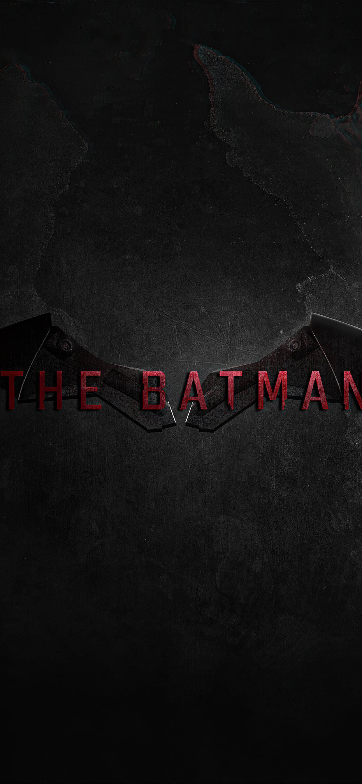 Batman Logo 桌布 壁紙 — 蝙蝠俠標誌在裂開的深色混凝土背景上發出紅色光芒。