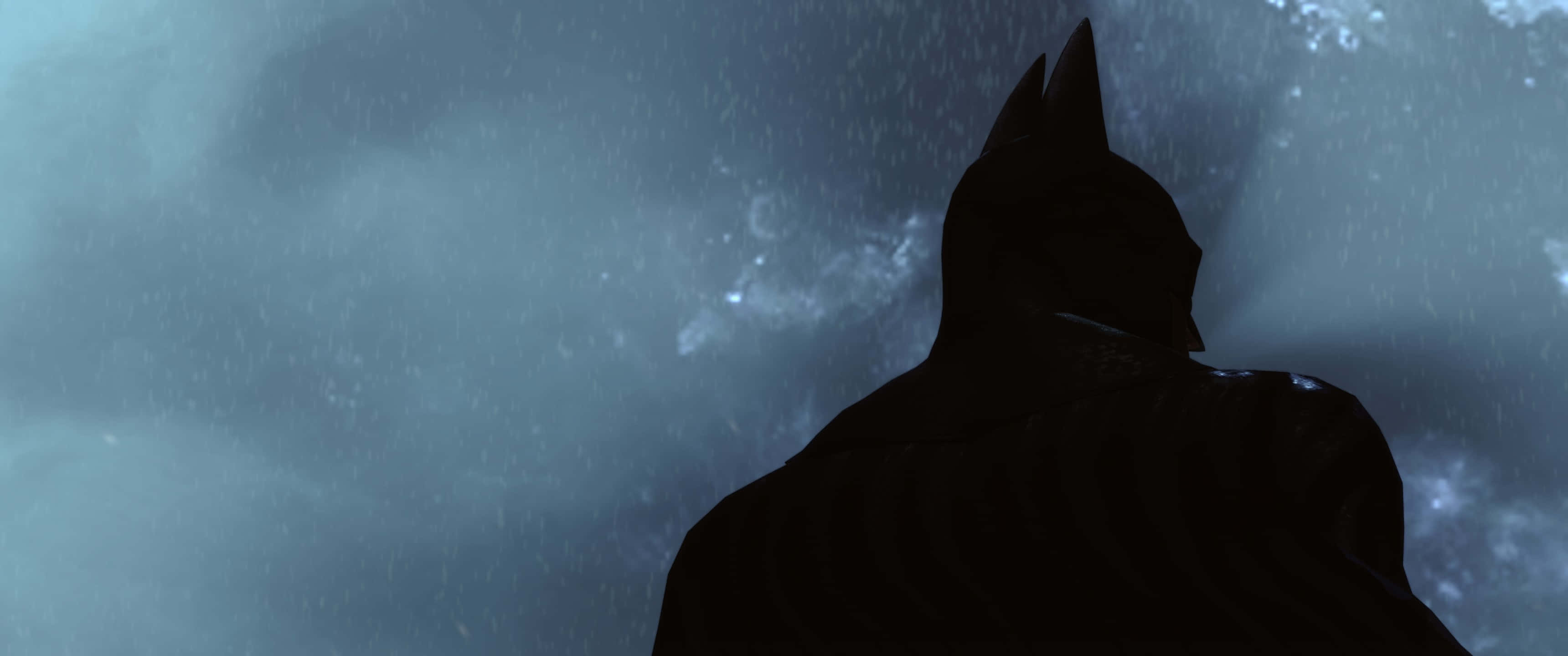 3440x1440p 桌布 壁紙 — 蝙蝠俠的剪影在暴風雨的夜空中高高聳立，雨水在他周圍落下。