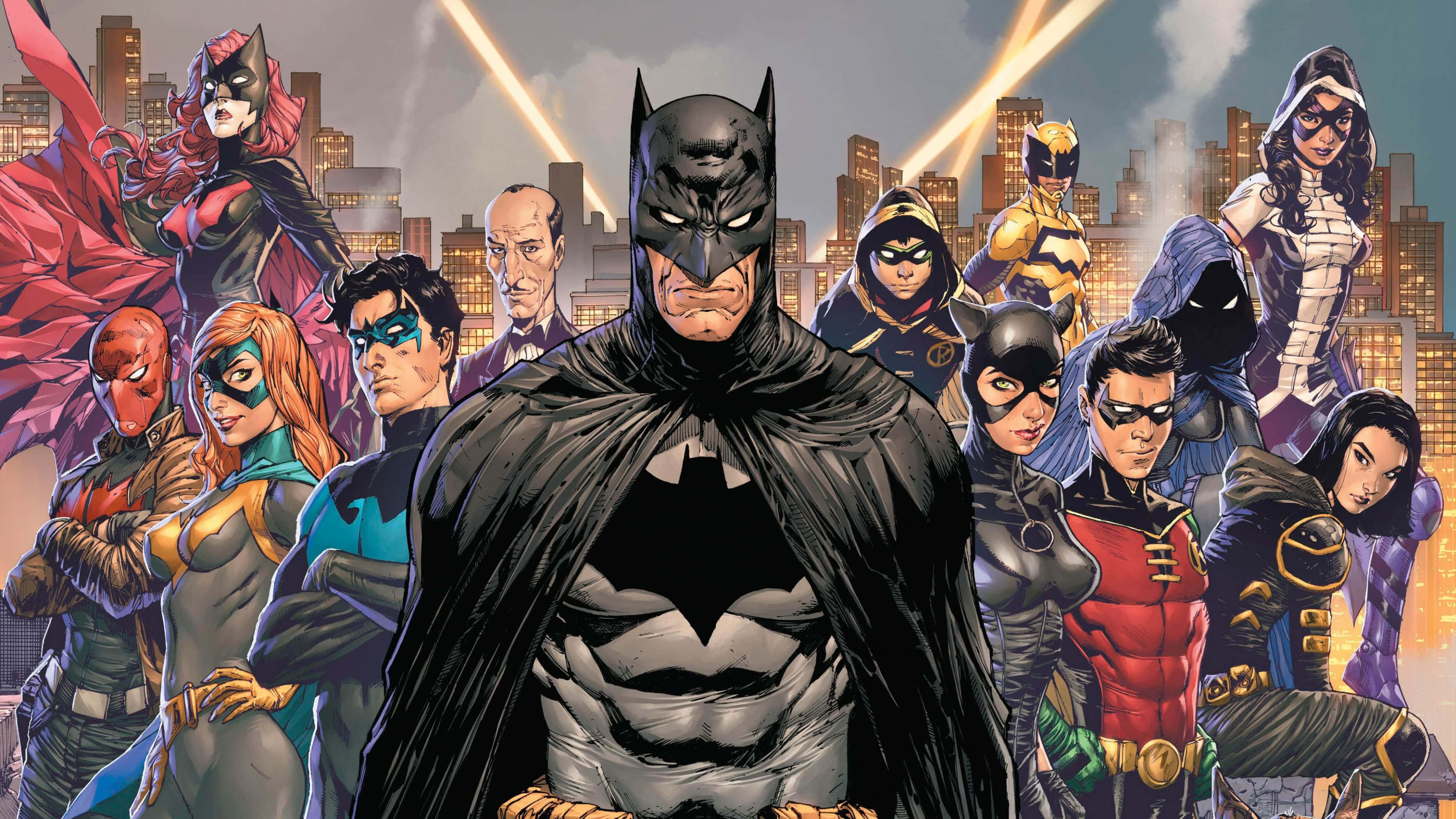 Bat-family 桌布 壁紙 — 蝙蝠俠站在中央，披風飄揚，一隊超級英雄在夜間發光的城市天際線前英勇地擺出姿勢。