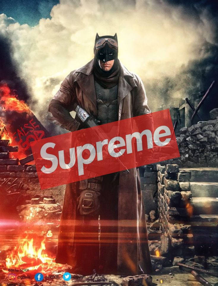 superhero supreme 桌布 壁紙 — 蝙蝠俠站在廢墟城市荒野中，火焰肆虐，一面紅色的Supreme旗幟佔據前景。