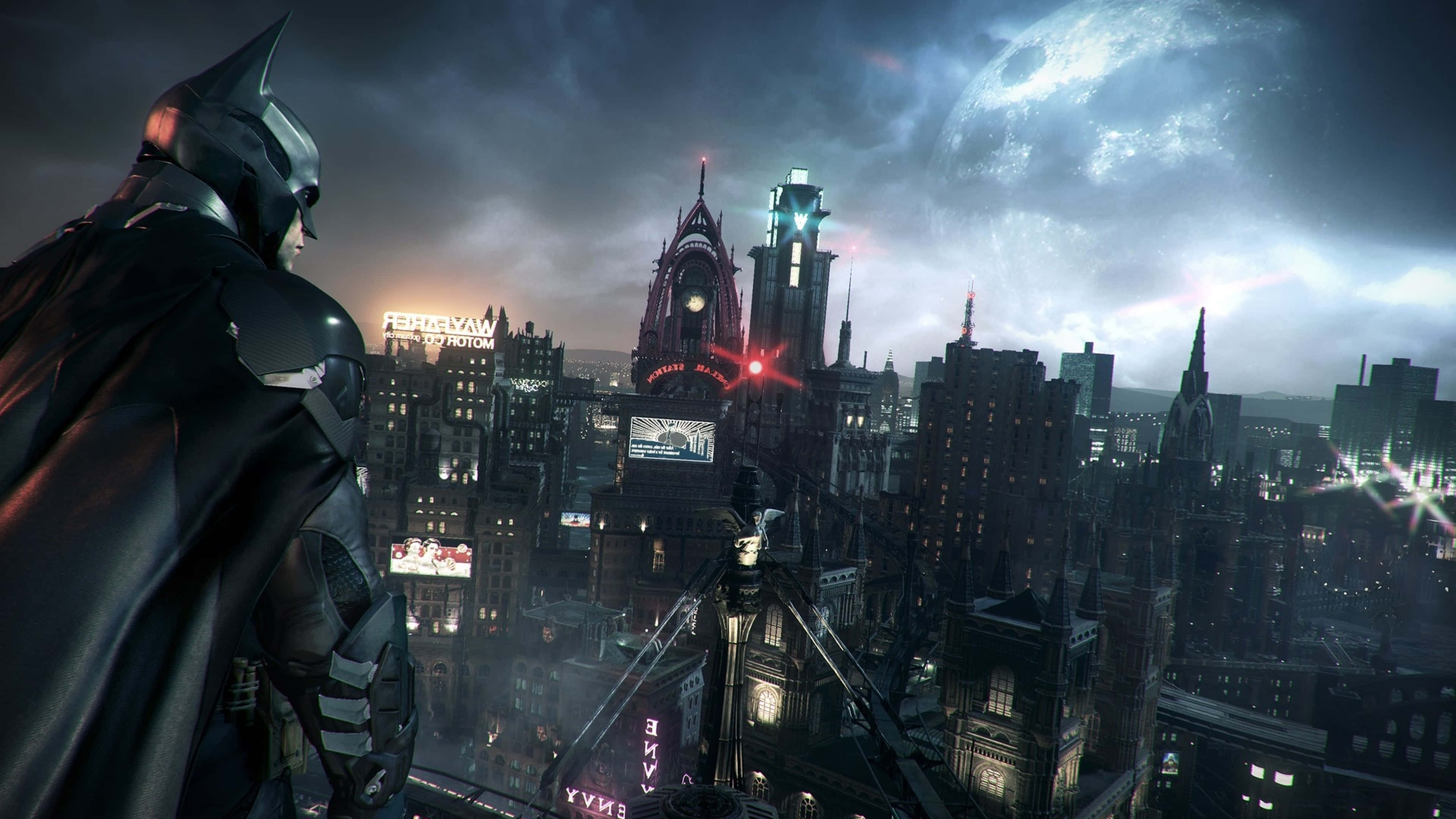 Gotham City 桌布 壁紙 — 蝙蝠俠站在摩天大樓頂端，俯瞰著暴風雨夜空下、巨大月亮映照中，霓虹燈閃爍的高譚市天際線。