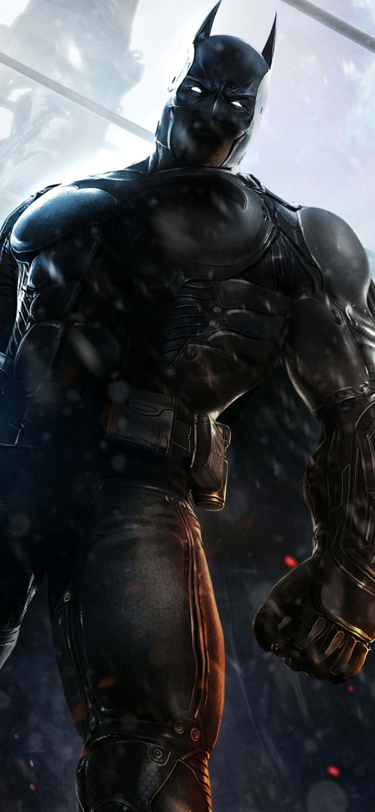 iPhone Xs Max Batman Arkham City 桌布 壁紙 — 蝙蝠俠站在被雨水浸濕的城市小巷中，他的裝甲戰衣在昏暗燈光下閃閃發光，雪花在他周圍飄落。