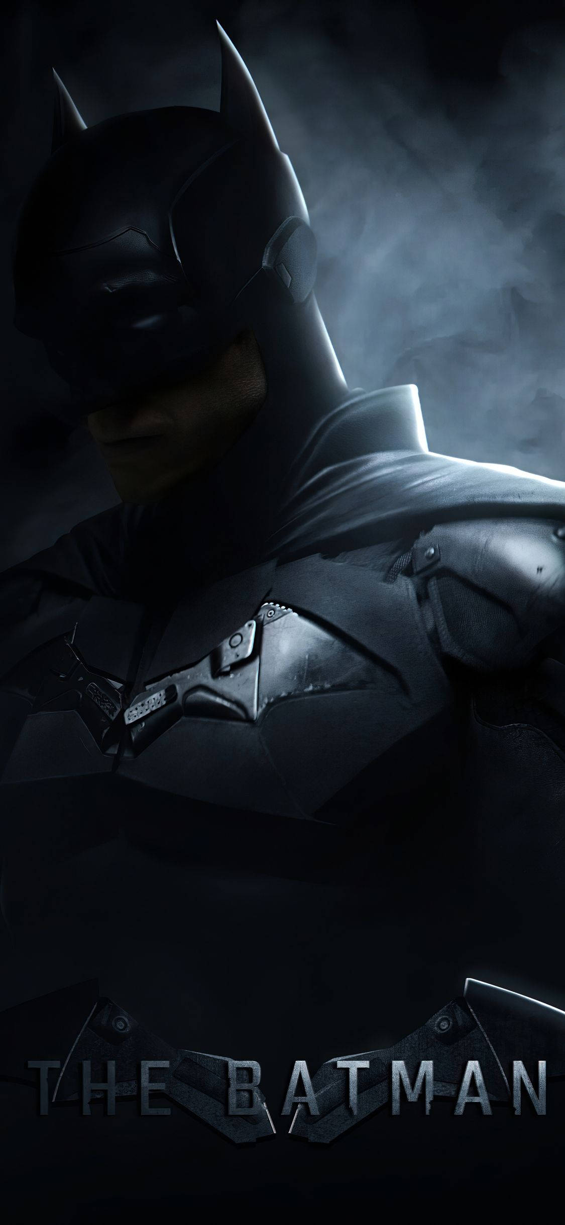 The Batman 桌布 壁紙 — 蝙蝠俠站在陰暗的迷霧中，霧氣圍繞著他的裝甲頭罩和披風旋轉。
