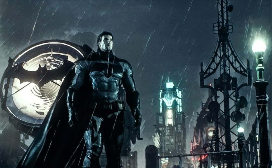 Batman Knightfall 桌布 壁紙 — 蝙蝠俠站在高譚市的屋頂上，在雨中披風飄揚，霓虹燈在暴風雨之夜閃爍。