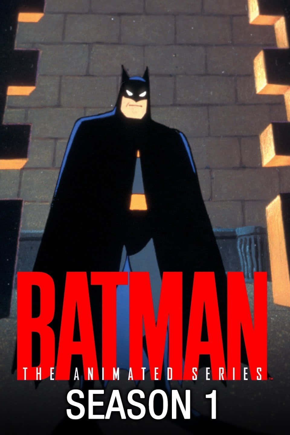 Batman Animated Adventures 桌布 壁紙 — 蝙蝠俠身穿標誌性的黑色套裝，高高站立在石牆前，溫暖的燈光投射出戲劇性的陰影。