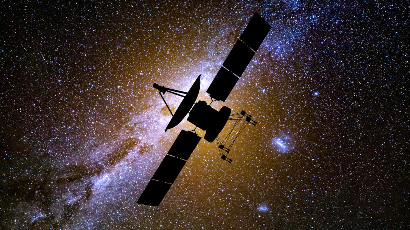 Space Satellite 桌布 壁紙 — 衛星剪影在充滿活力的星場中運行，周圍有發光的星雲和宇宙塵埃。