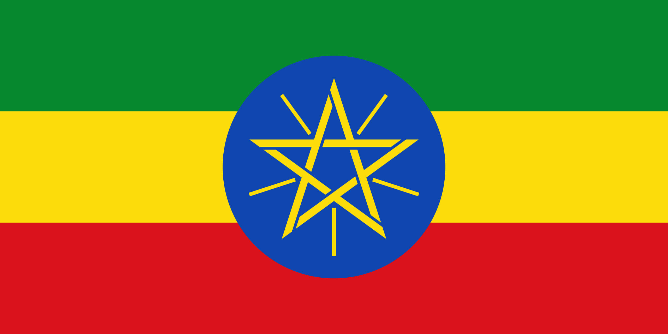 Flag 桌布 壁紙 — 衣索比亞國旗由綠色、黃色和紅色的水平條紋組成，中央有一個藍色圓盤，內有一顆黃色星星。
