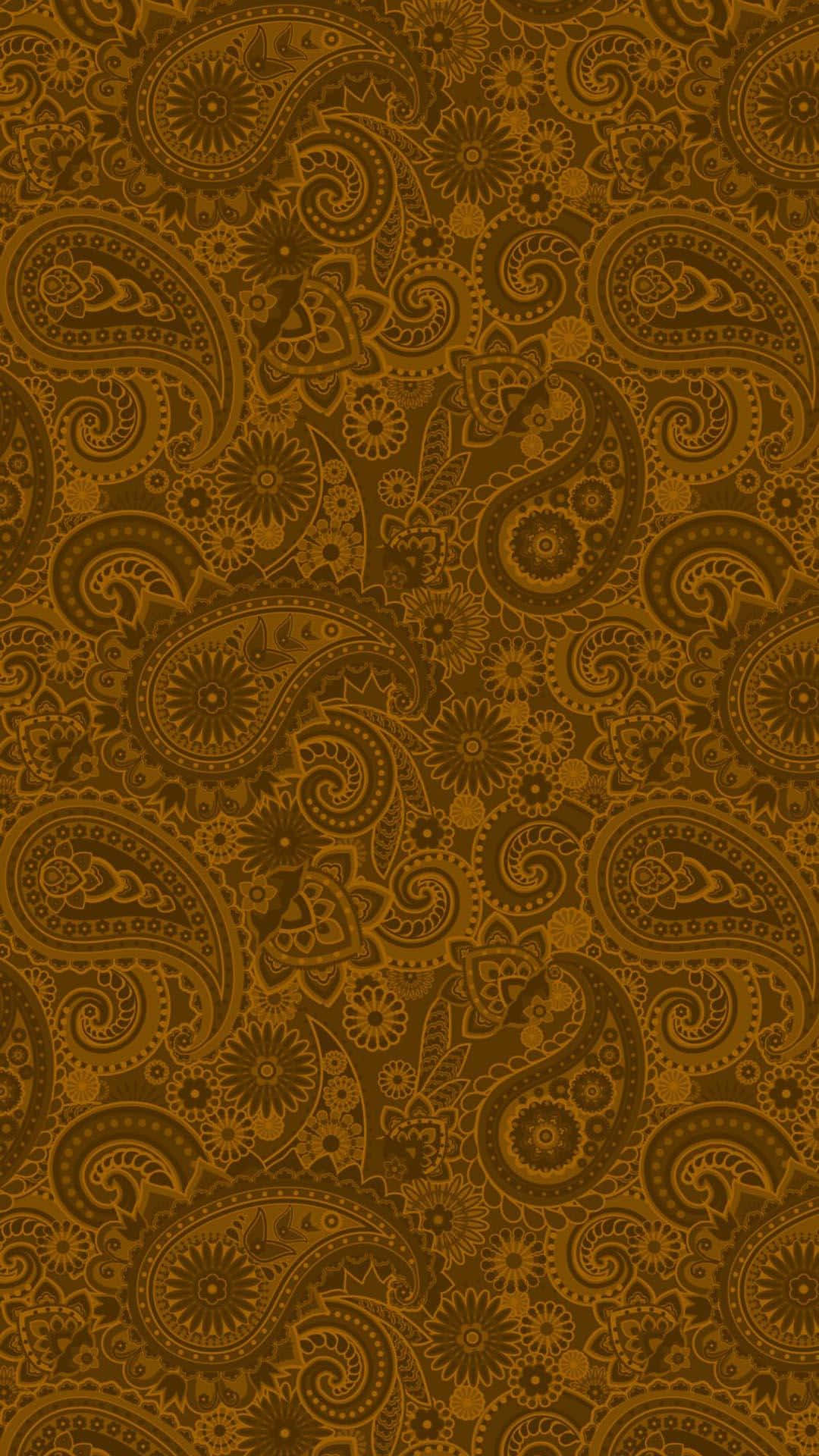 Paisley 桌布 壁紙 — 複雜的佩斯利圖案以豐富的棕色和金色色調覆蓋整個框架，帶有漩渦花卉圖案。