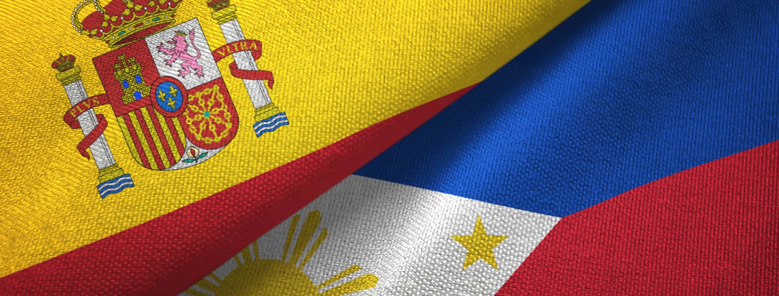 Spanish 桌布 壁紙 — 西班牙和菲律賓國旗的紋理布料以對角線重疊，帶有精緻刺繡和鮮豔色彩。