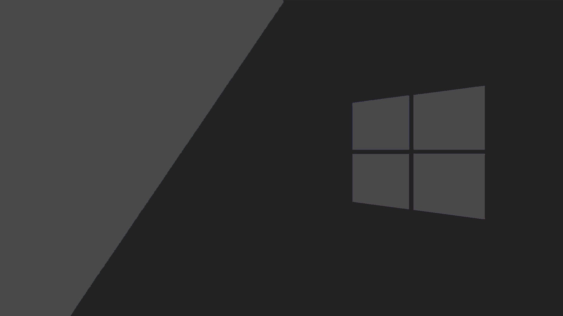 黑色 Windows 10 桌布 壁紙 — 角落帶有低調Windows標誌的簡約深灰色桌布。
