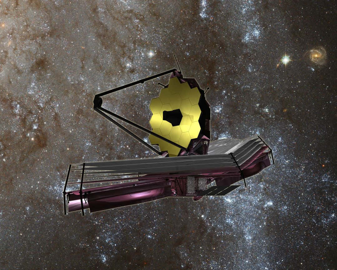 Telescope 桌布 壁紙 — 詹姆斯·韋伯太空望遠鏡在深邃太空中，以閃爍的星星和遙遠星系為背景漂浮。