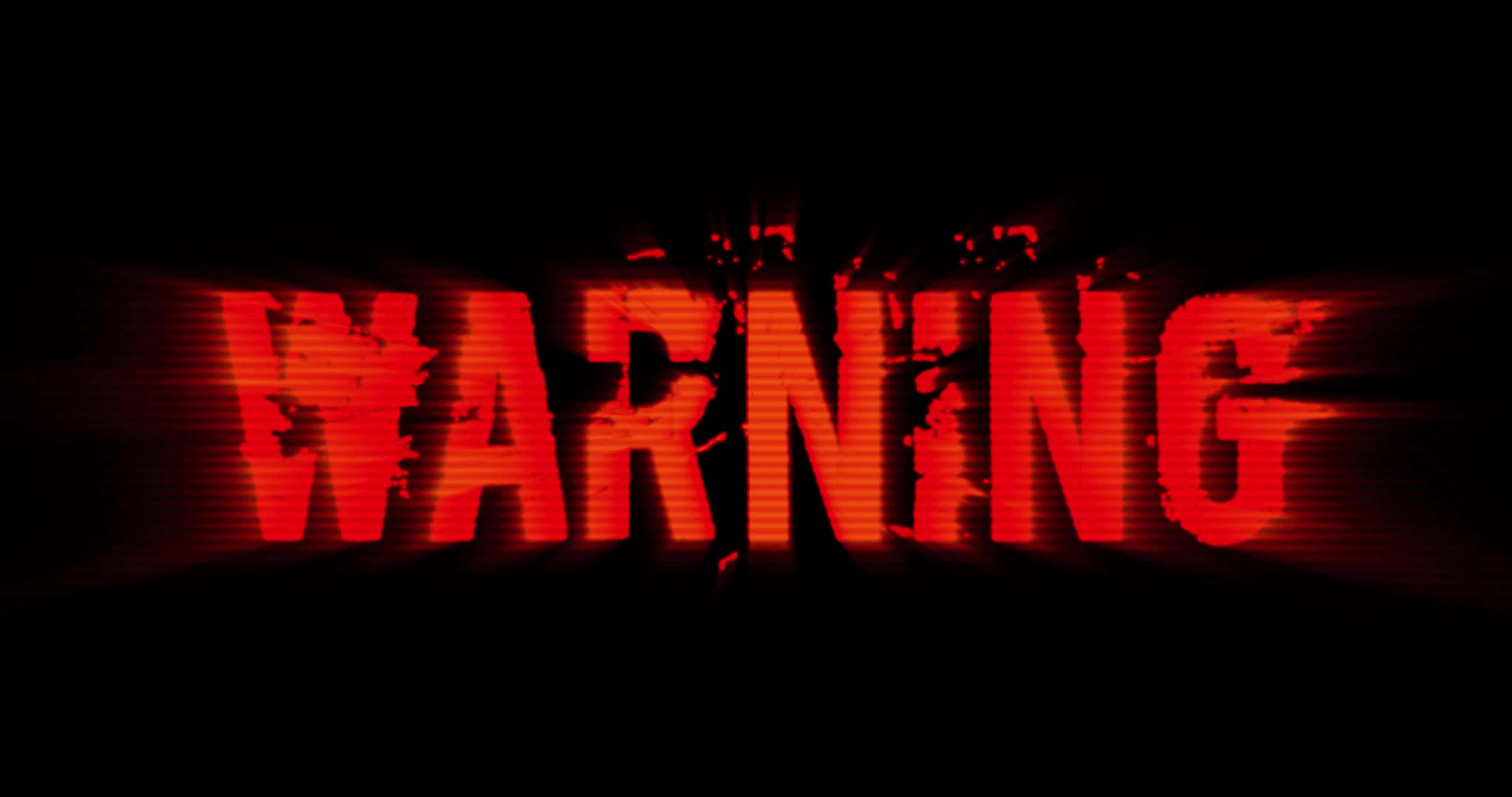 warning 桌布 壁紙 — 「警告」一詞在黑色背景上以鋸齒狀紅色字母發光，帶有數位扭曲效果。