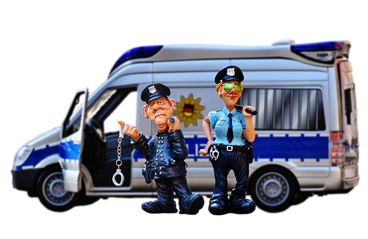 警察人偶與廂型車 壁紙
