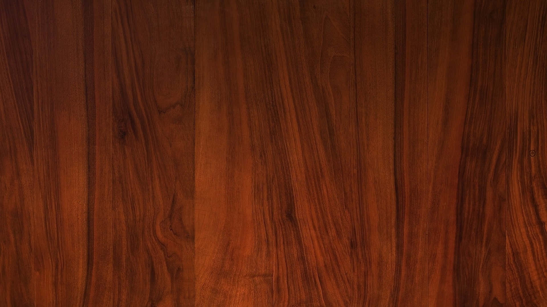 Brown Wood 桌布 壁紙 — 豐富暖色調木紋紋理，帶有流暢的自然圖案和深紅褐色調。