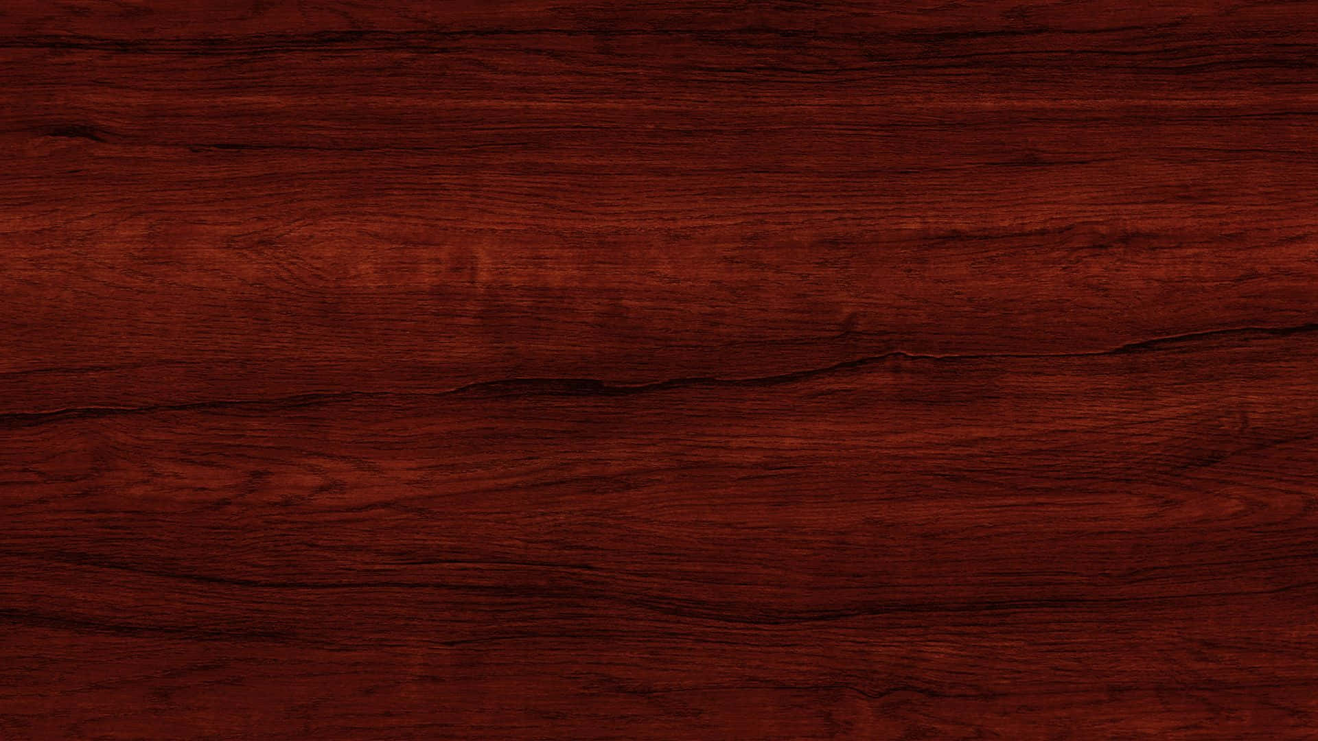 Wood Texture 桌布 壁紙 — 豐富深紅色木紋紋理，帶有自然流動圖案和細微高光。
