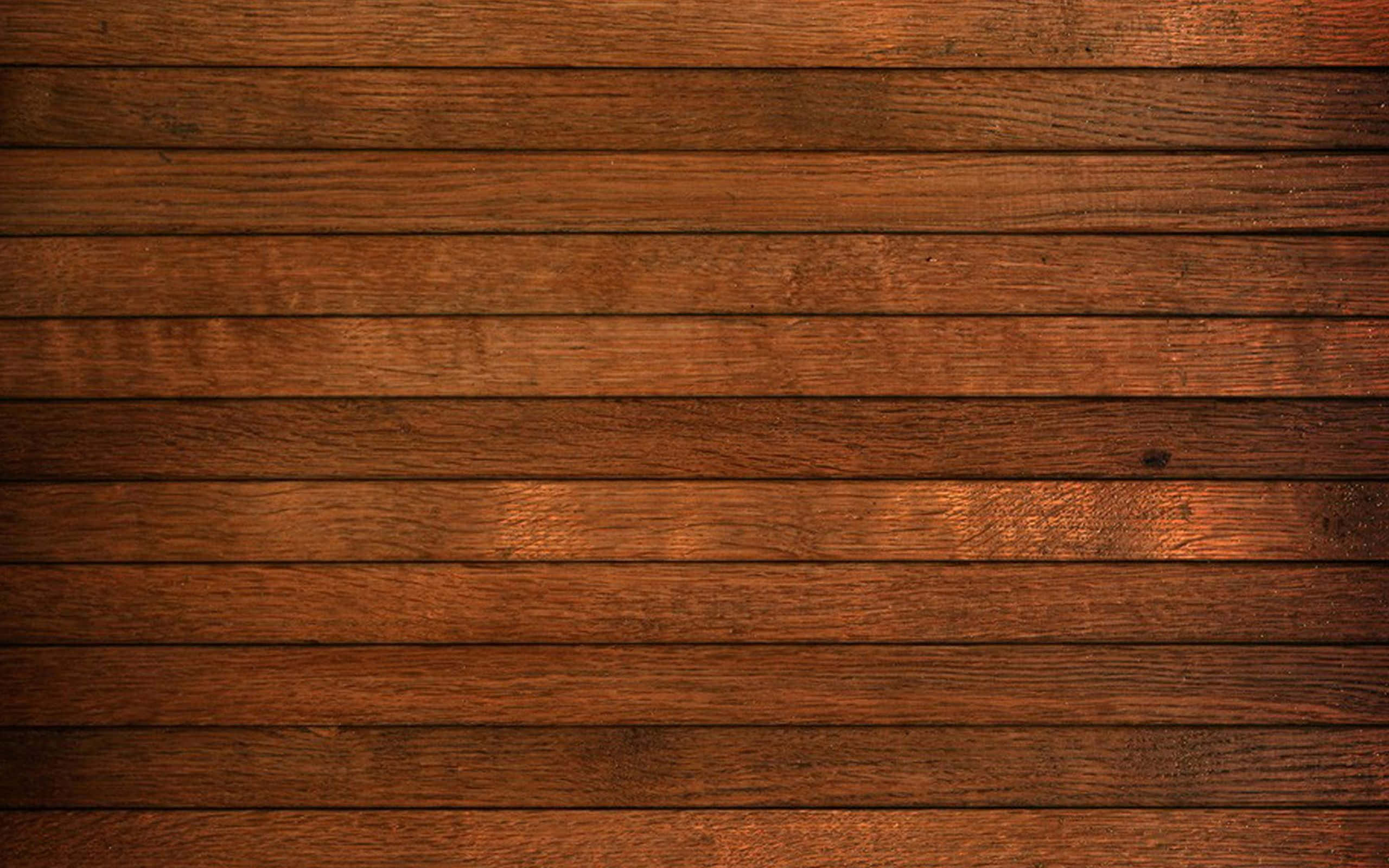 Wooden 桌布 壁紙 — 豐富溫暖的棕色木板，帶有天然木紋圖案和微妙的燈光變化。