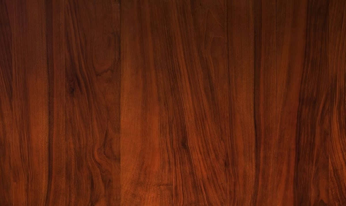 Mahogany 桌布 壁紙 — 豐富溫暖的棕色木紋紋理，帶有自然流動的圖案和細微的節疤。