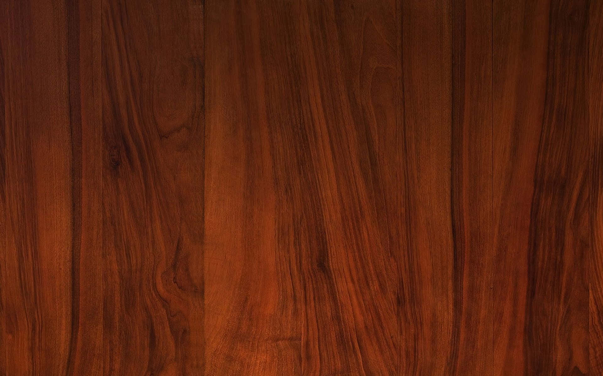 Wooden 桌布 壁紙 — 豐富的暖色調木紋紋理，帶有自然流暢的圖案和深沉的紅褐色調。