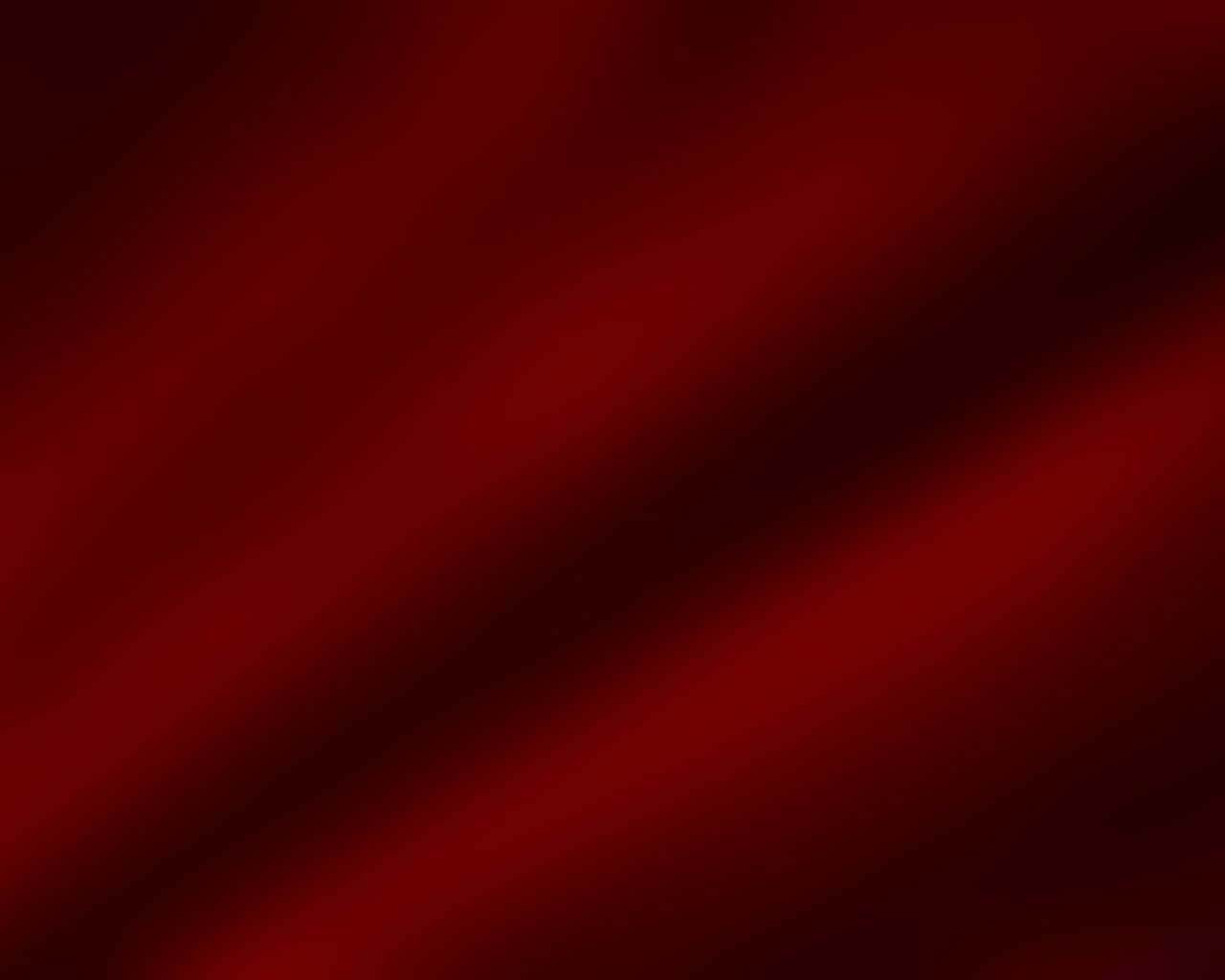 Dark Red Aesthetic 桌布 壁紙 — 豐富的深紅色布料，帶有柔軟的對角皺褶和微妙的漸變照明，營造出奢華的質感。