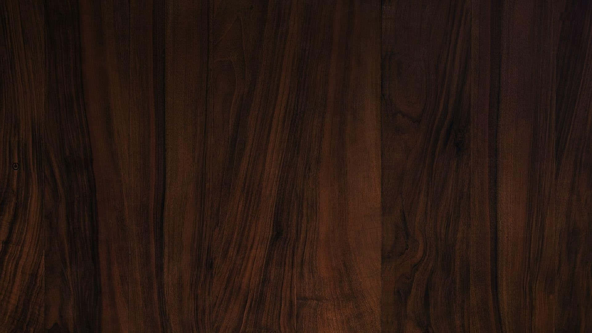 Mahogany 桌布 壁紙 — 豐富的深色木紋紋理，帶有深棕色色調和自然流動的圖案。